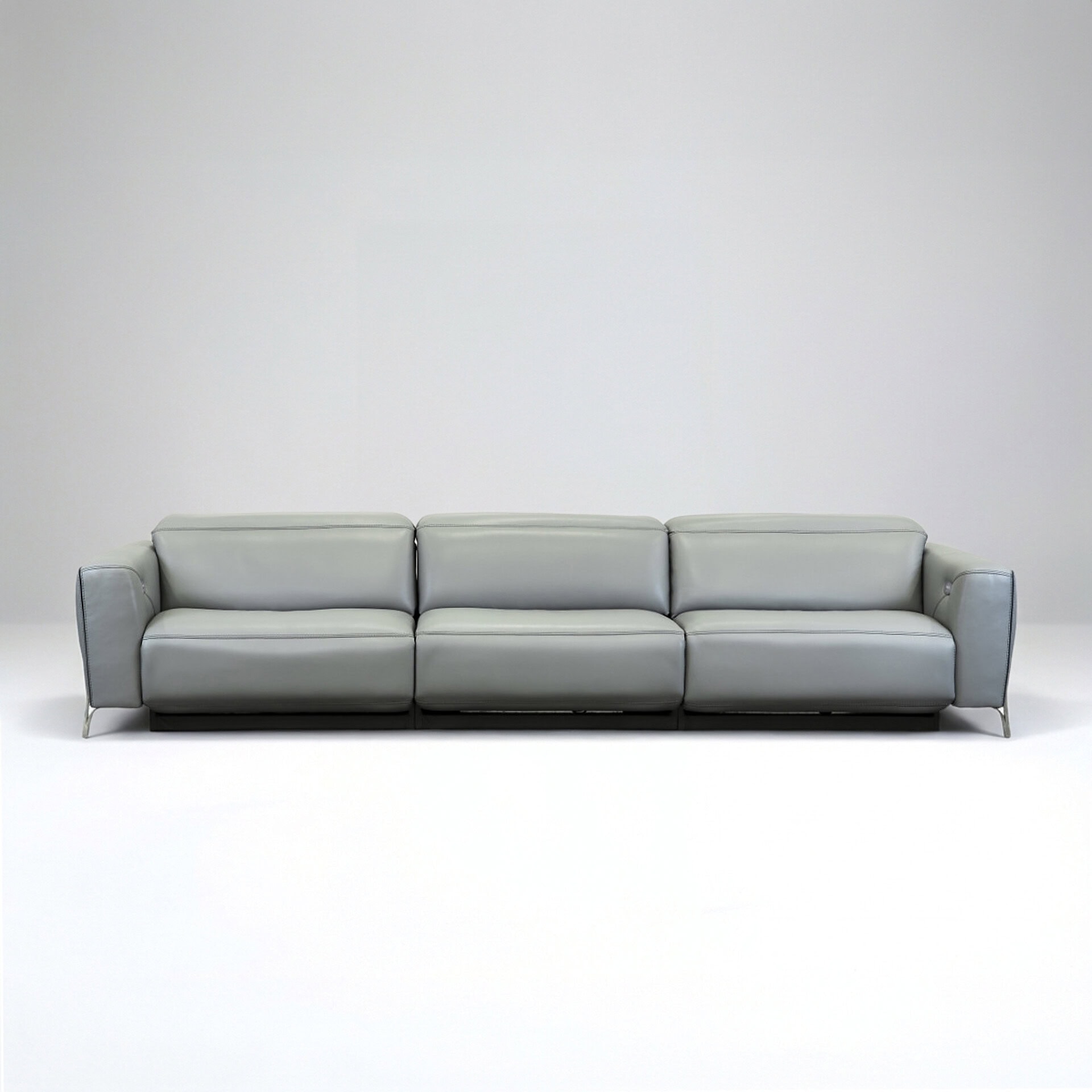 Contemporary gray leather sofa ideal for modern living rooms.