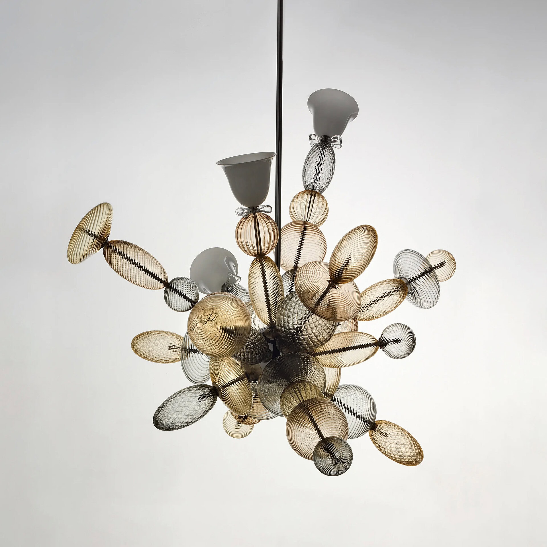 Elegant glass pendant chandelier with metallic and transparent glass elements.