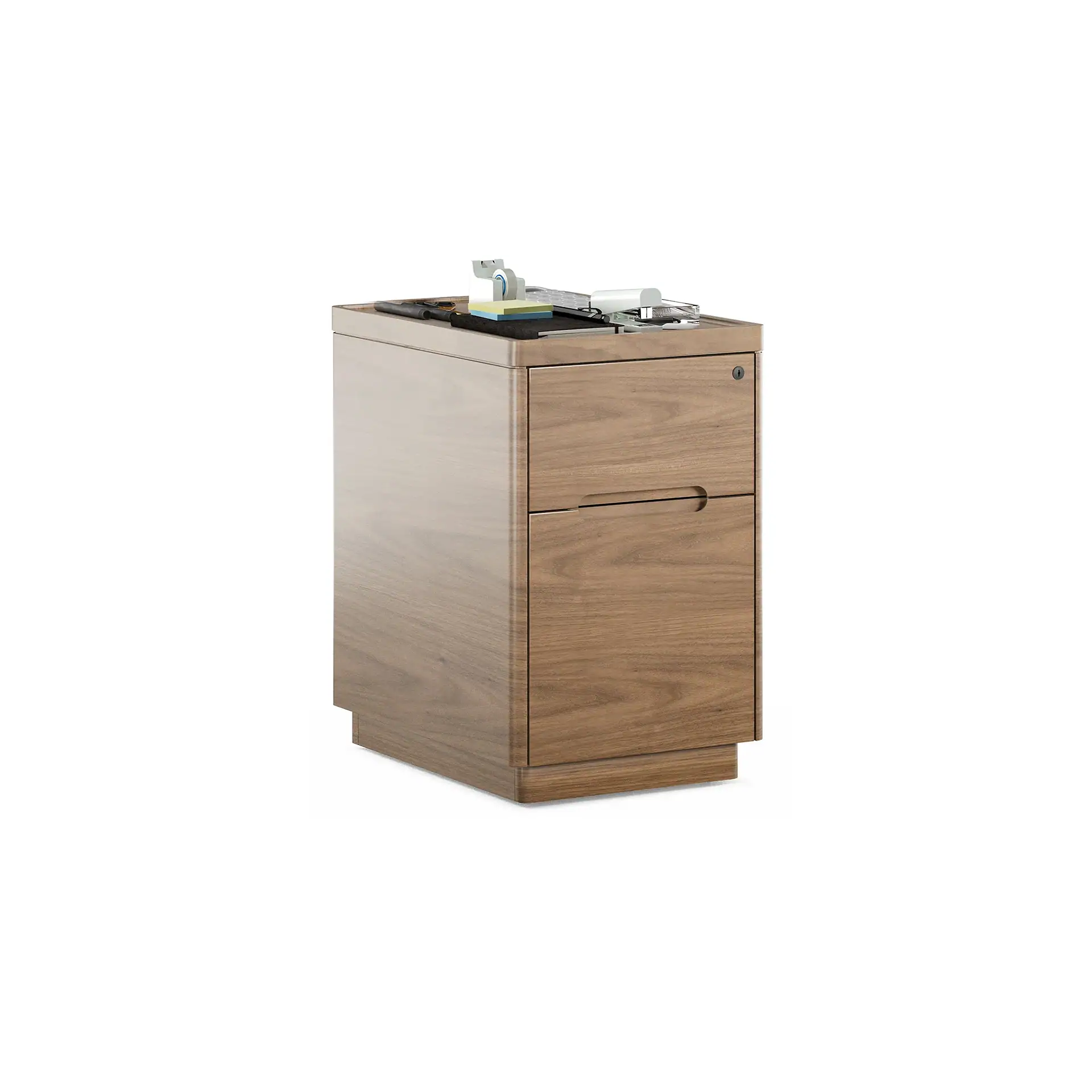 A two-drawer wooden filing cabinet with a walnut finish, featuring office supplies like a tape dispenser, sticky notes, and a stapler on its top surface.