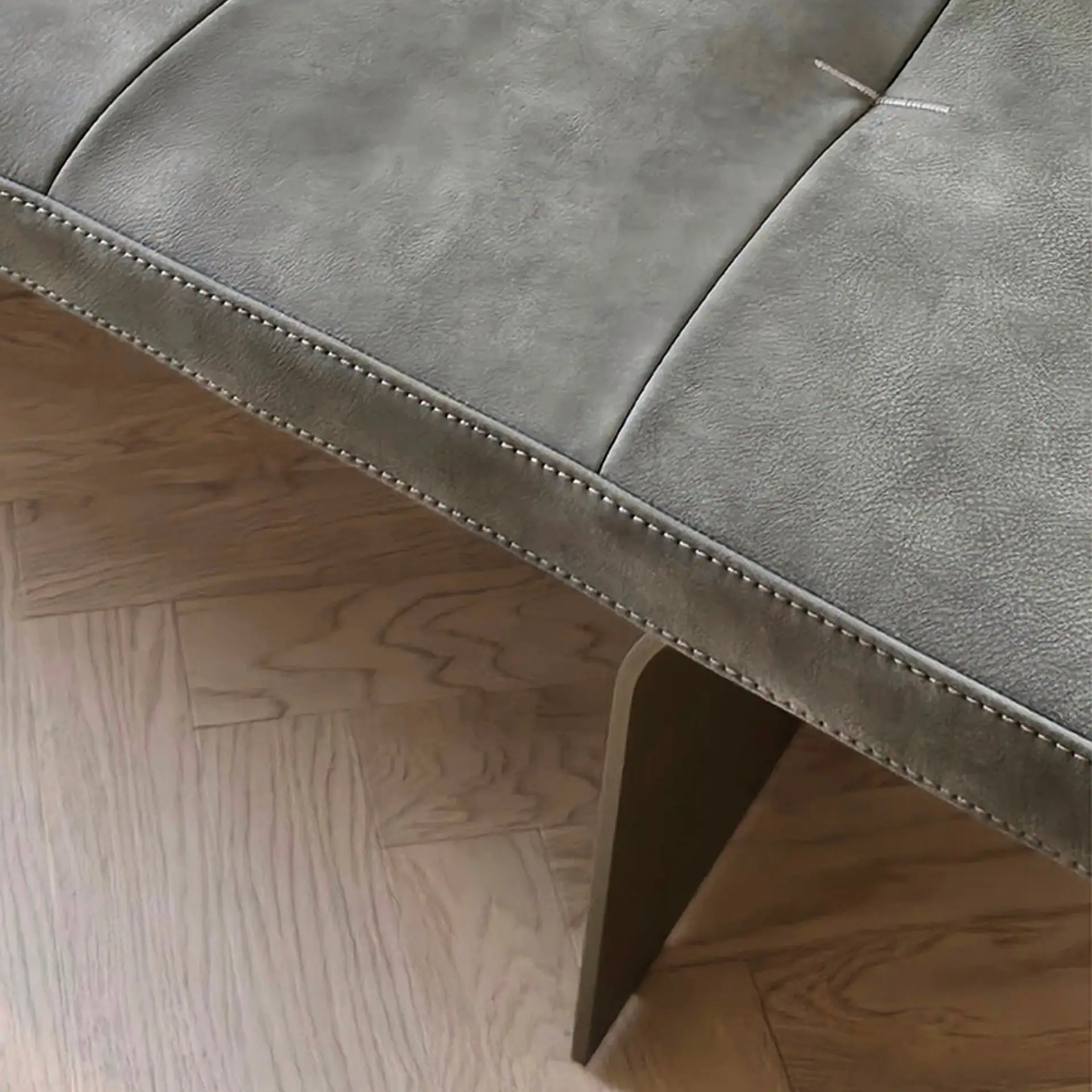 Close-up of the Minerva Bench upholstery and stitching details.