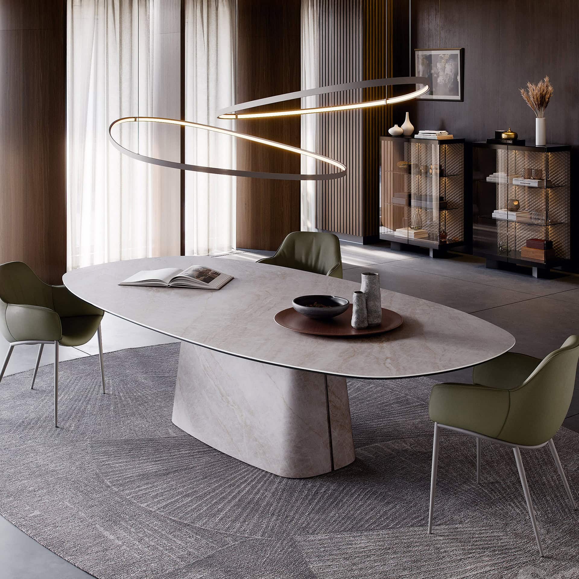 Elegant modern dining room with stylish furniture and unique lighting fixture.