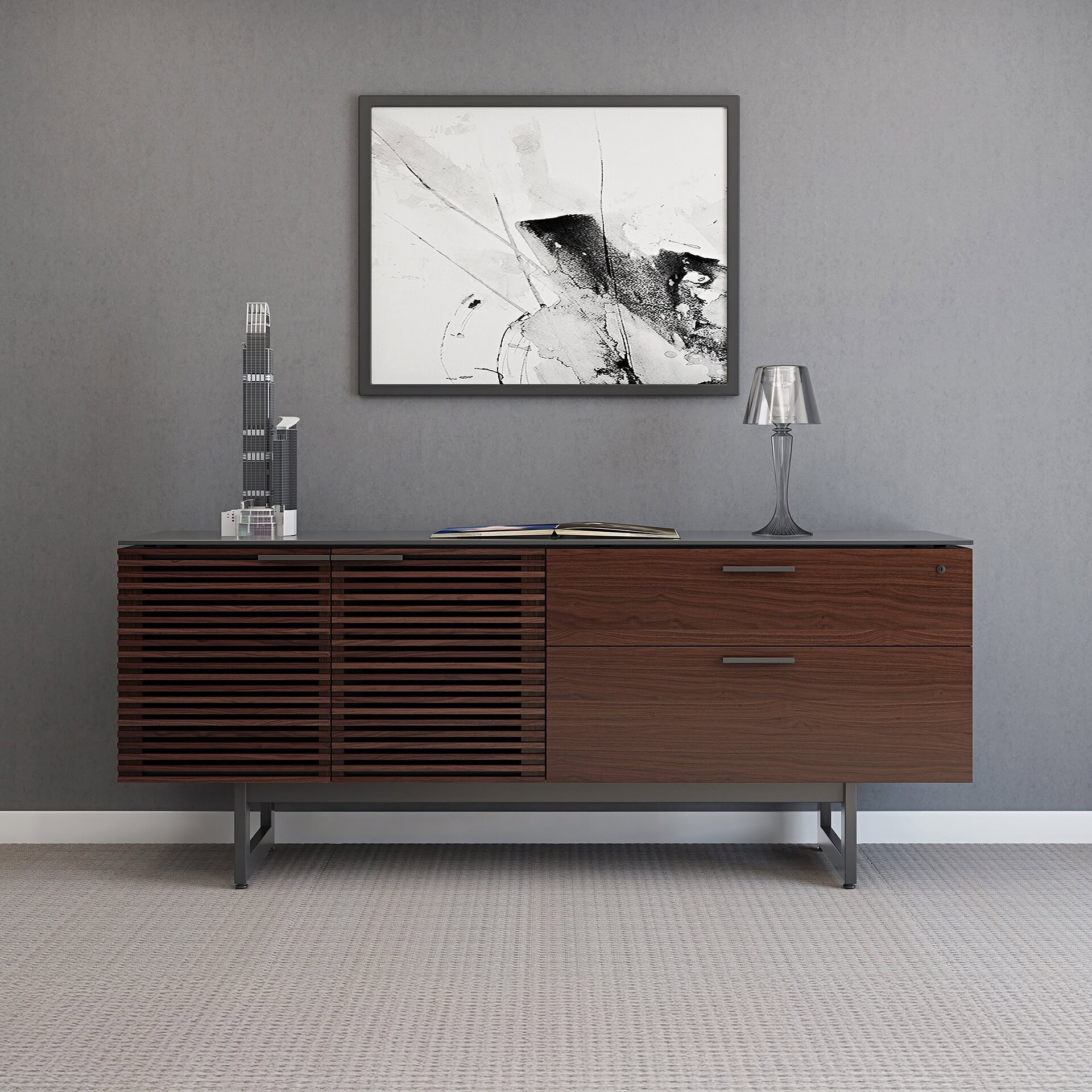 Stylish wooden sideboard with abstract artwork and decorative items in a contemporary living space.