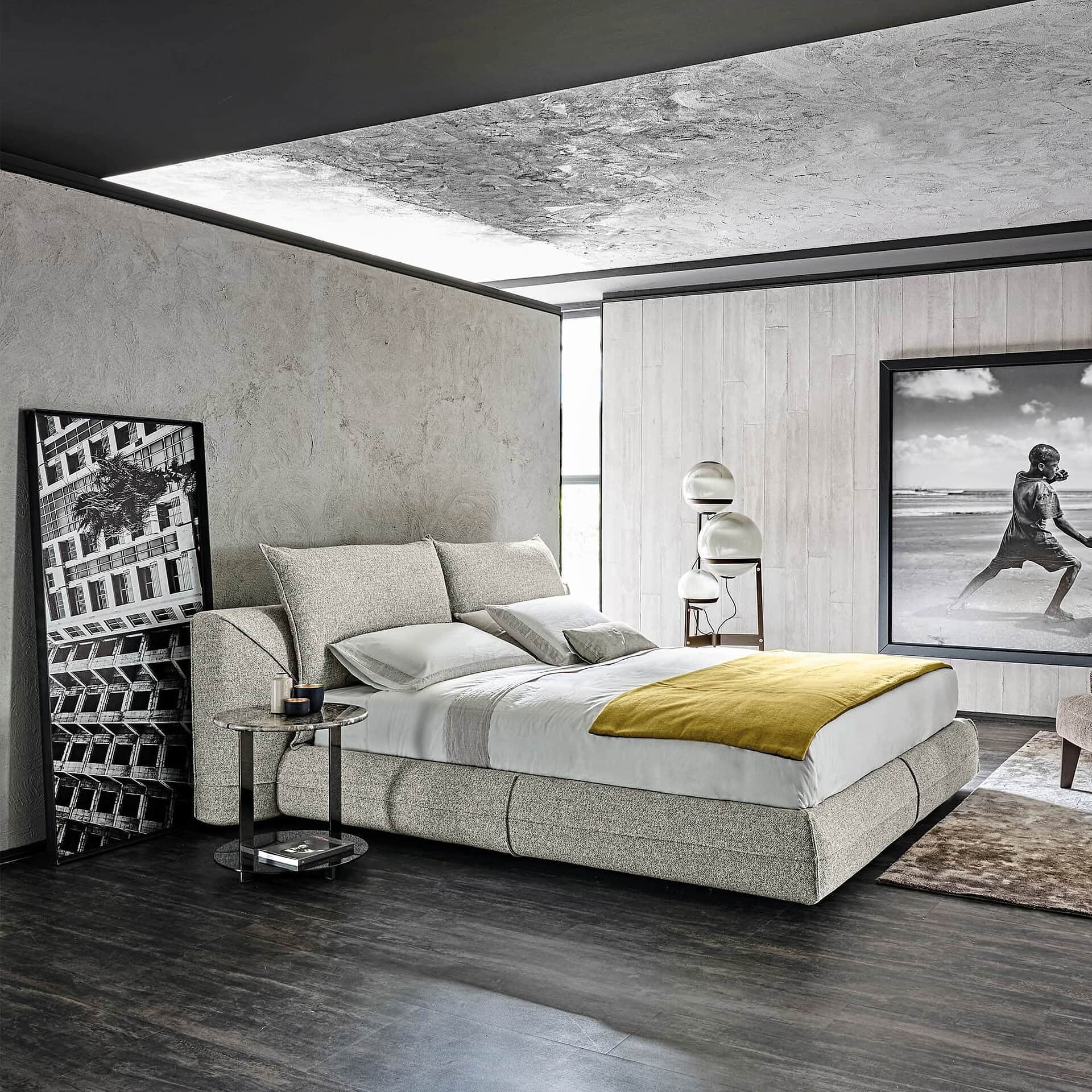 Elegant upholstered bed with modern design and stylish bedroom decor.