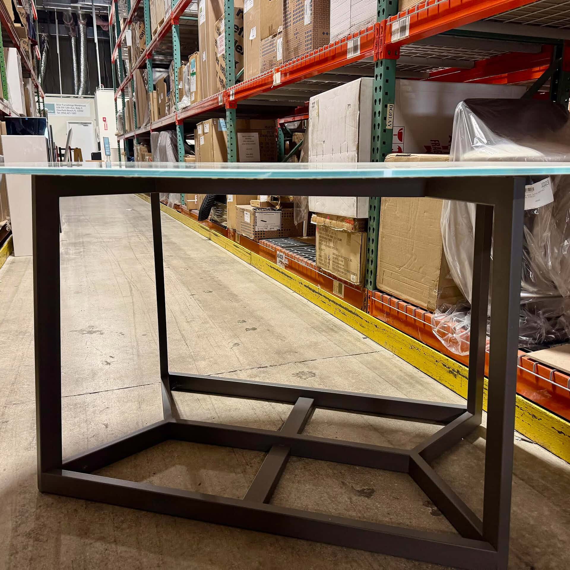 Metal table frame in warehouse for office or home furniture.