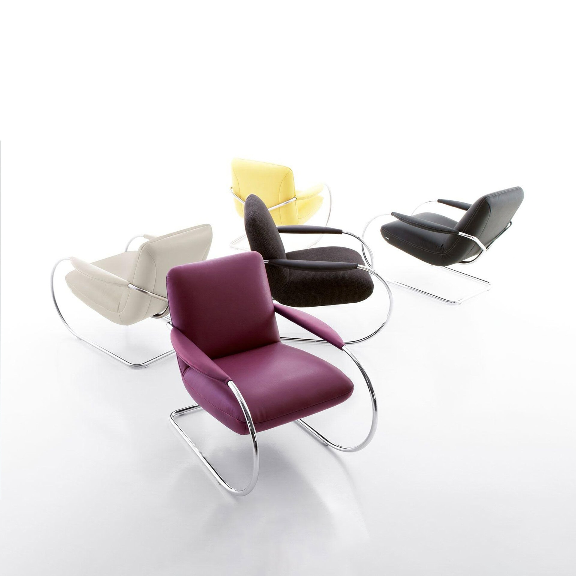 Elegant modern lounge chairs with vibrant colors and contemporary design.