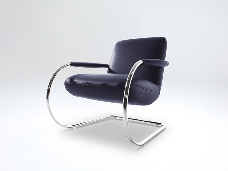 Black lounge chair with chrome frame, ideal for office or living room seating. Stylish, comfortable,.