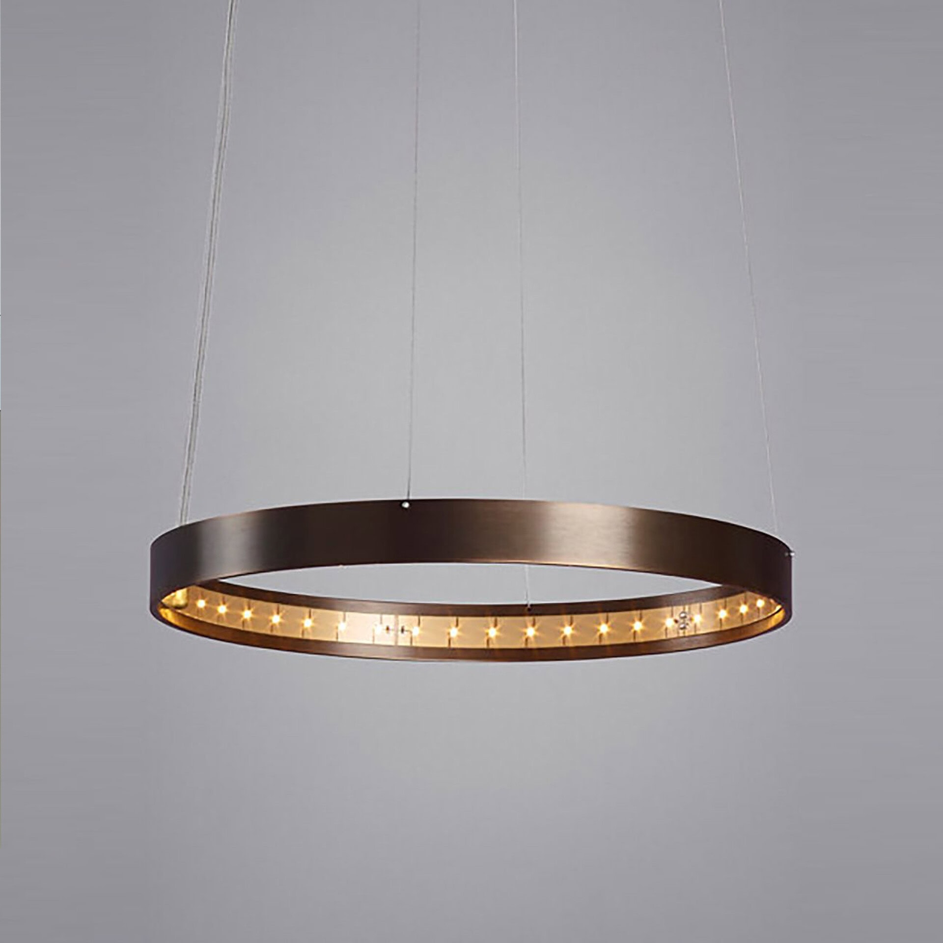 Contemporary circular pendant light with integrated LED stars for modern interior design.