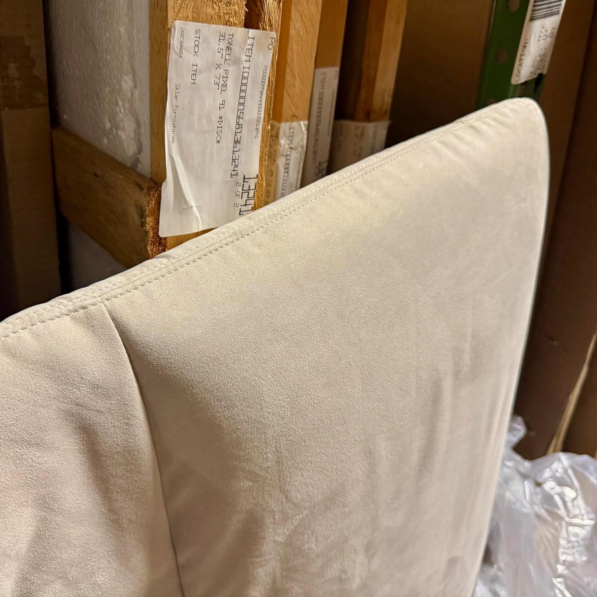 Elegant beige fabric chair showcasing quality craftsmanship and comfort.