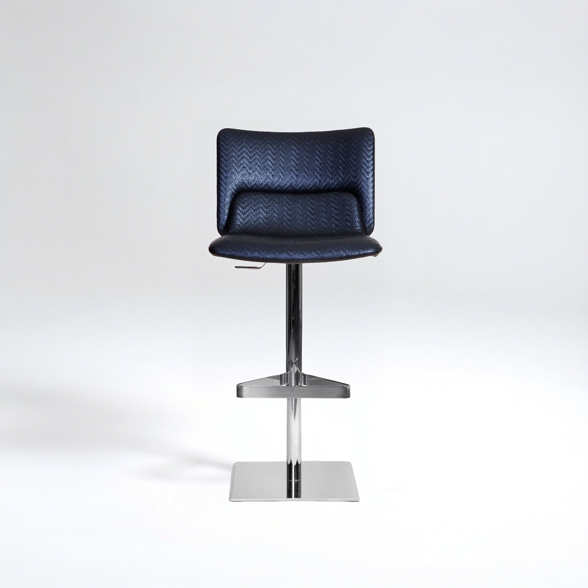 Office bar stool with blue fabric upholstery and adjustable height.