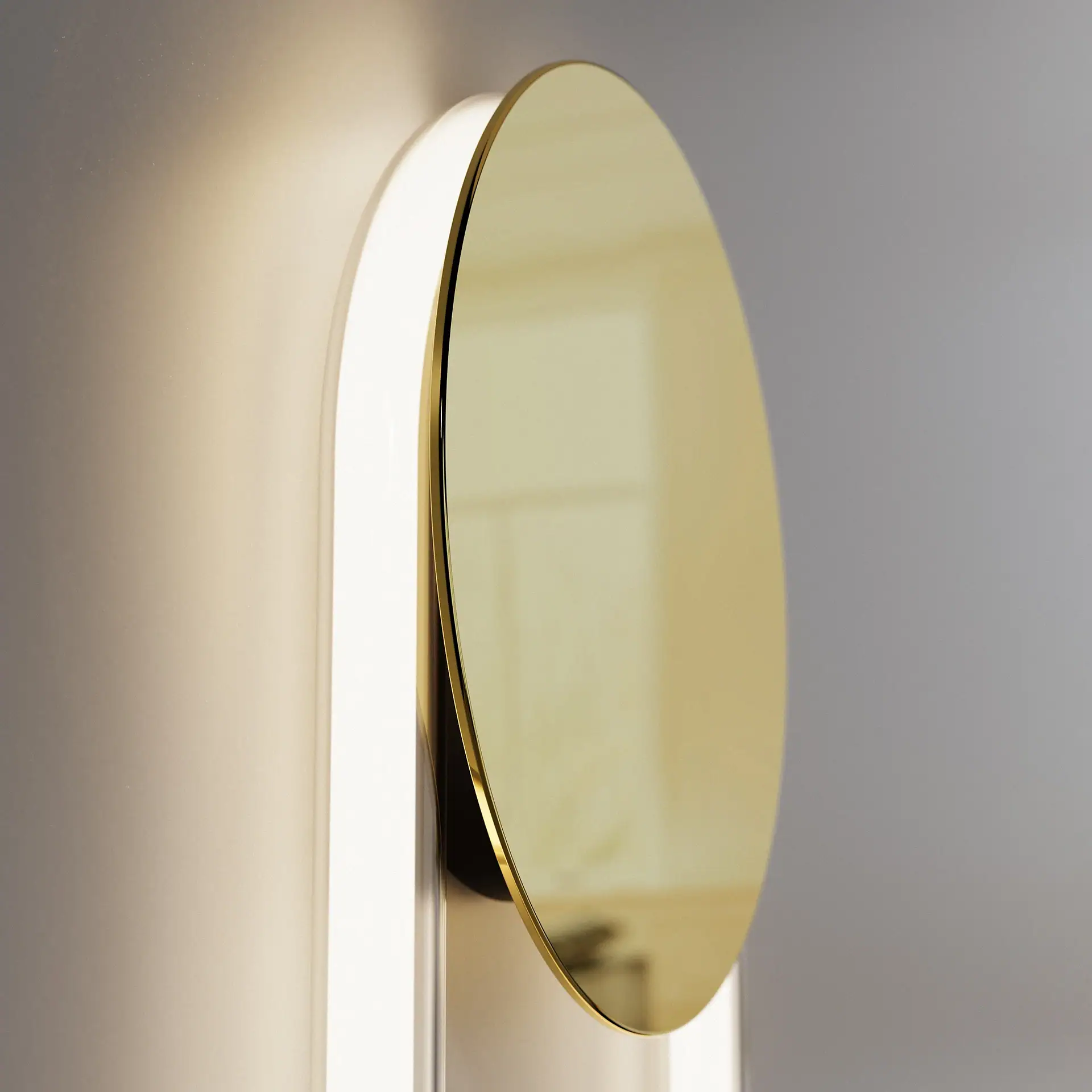 RA Sculptural Wall Sconce with gold finish and oval mirror.