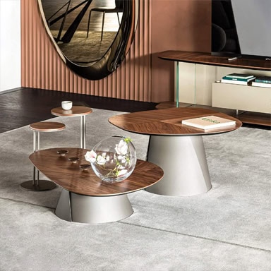 Elegant contemporary coffee tables with wooden tops and white bases, perfect for stylish living spac.