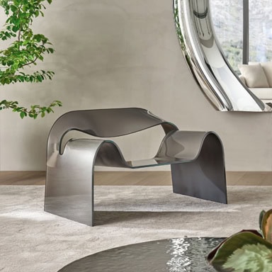 Sleek metallic Marquee lounge chair with contemporary design.