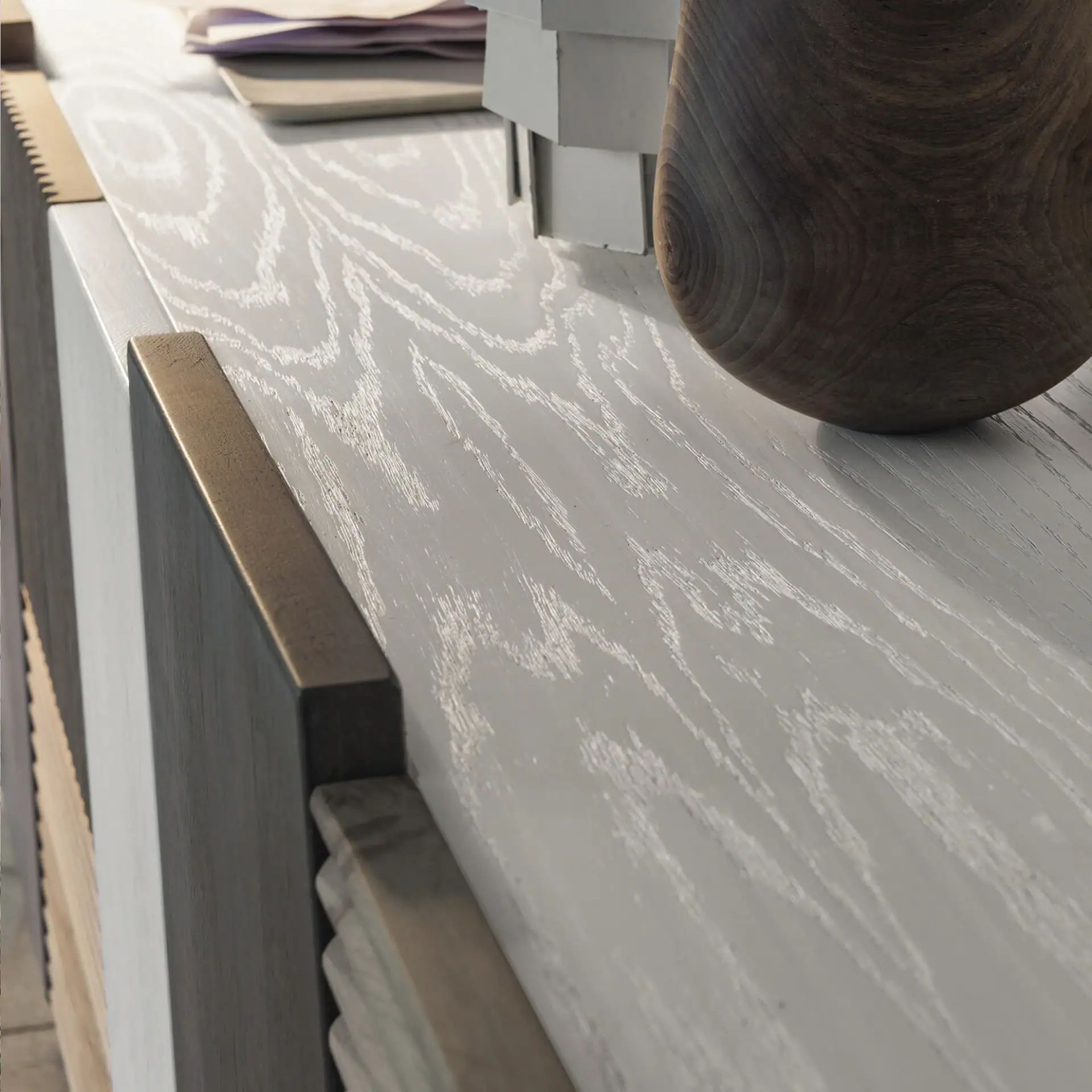 Close-up of the Zero.16 Sideboard showcasing textured wood surface and contemporary style.