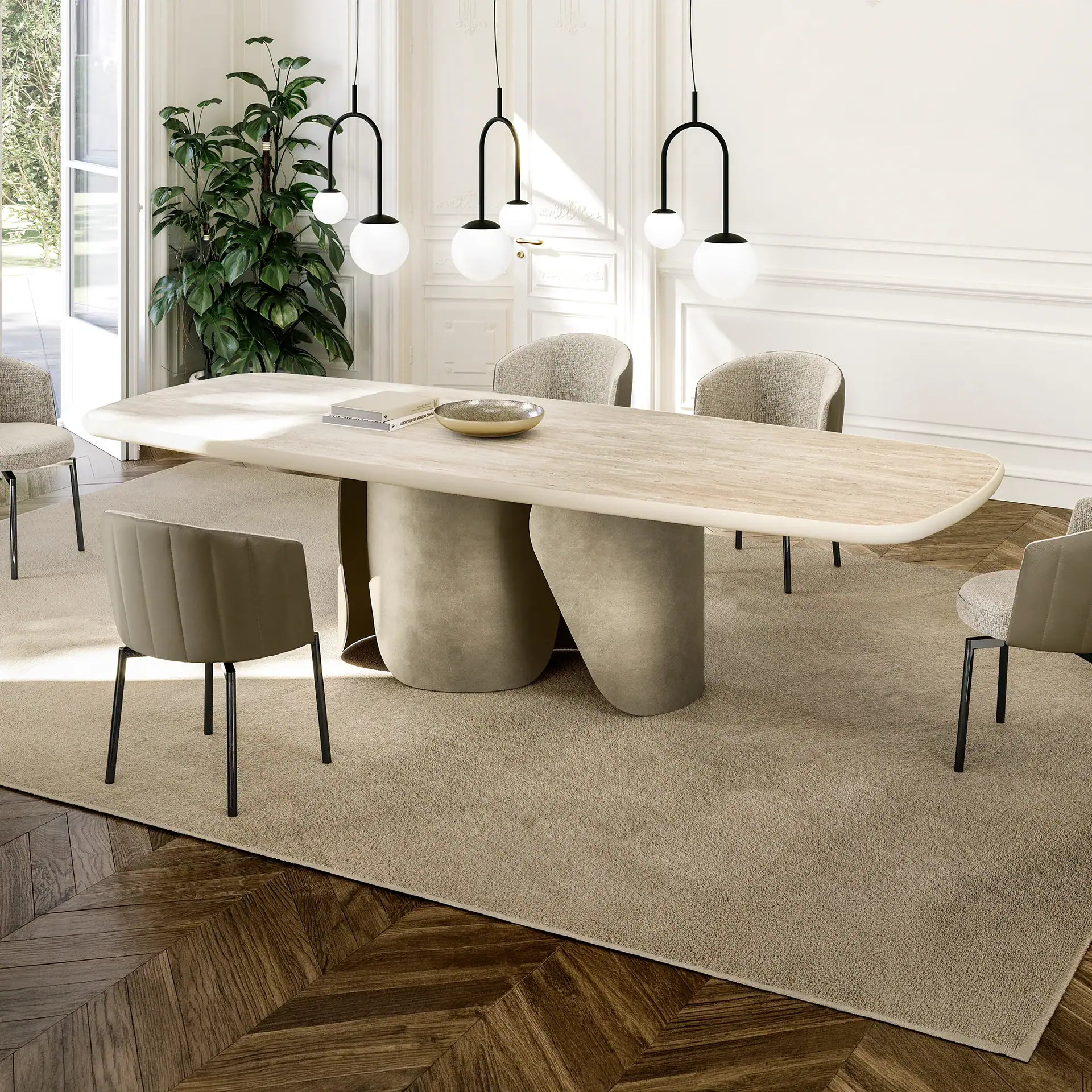 A modern dining room with a light oval table, six chairs, three black and white pendant lights, a large Monstera plant, and a beige rug over a herringbone wood floor.
