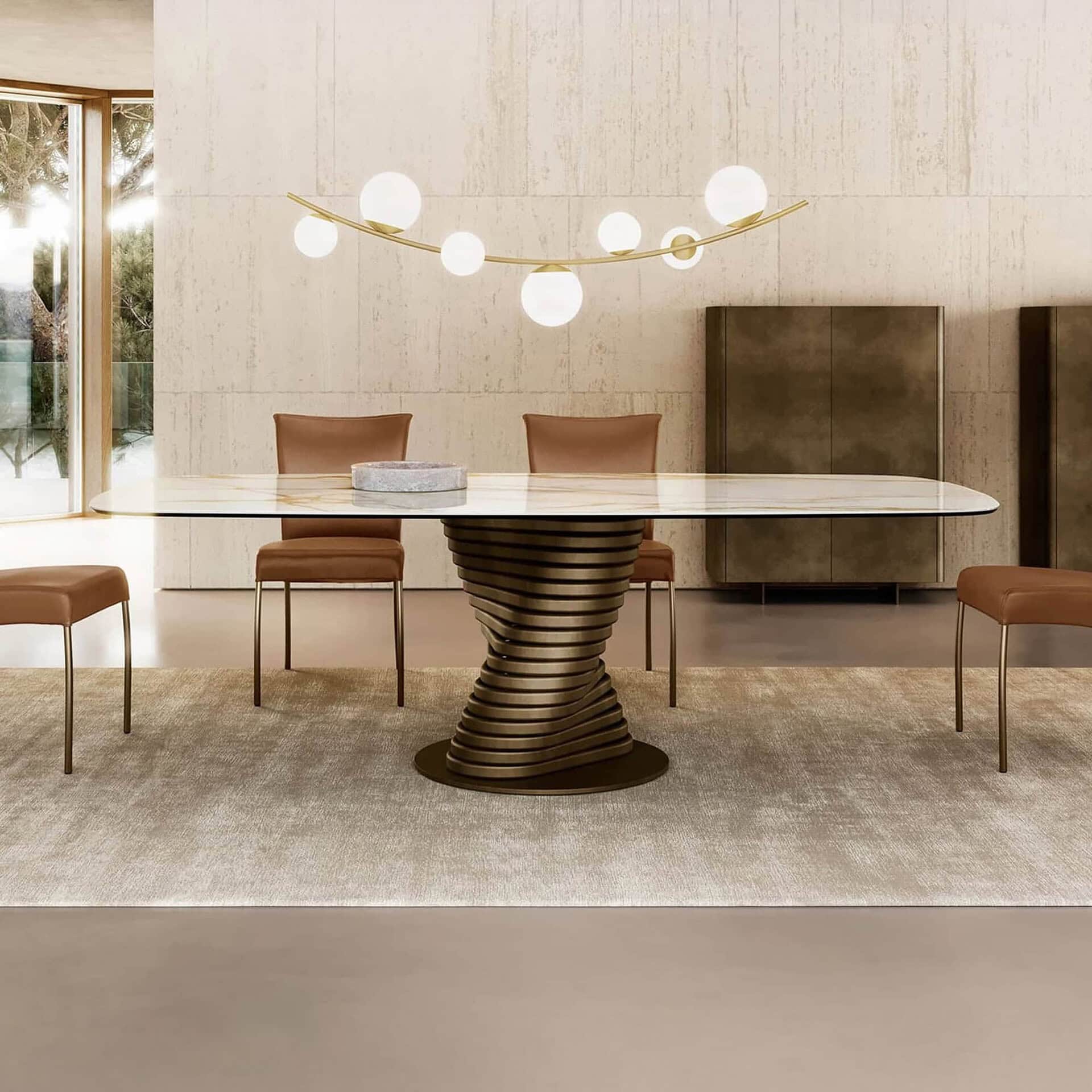 Contemporary dining room featuring a sculptural table and modern lighting fixtures.