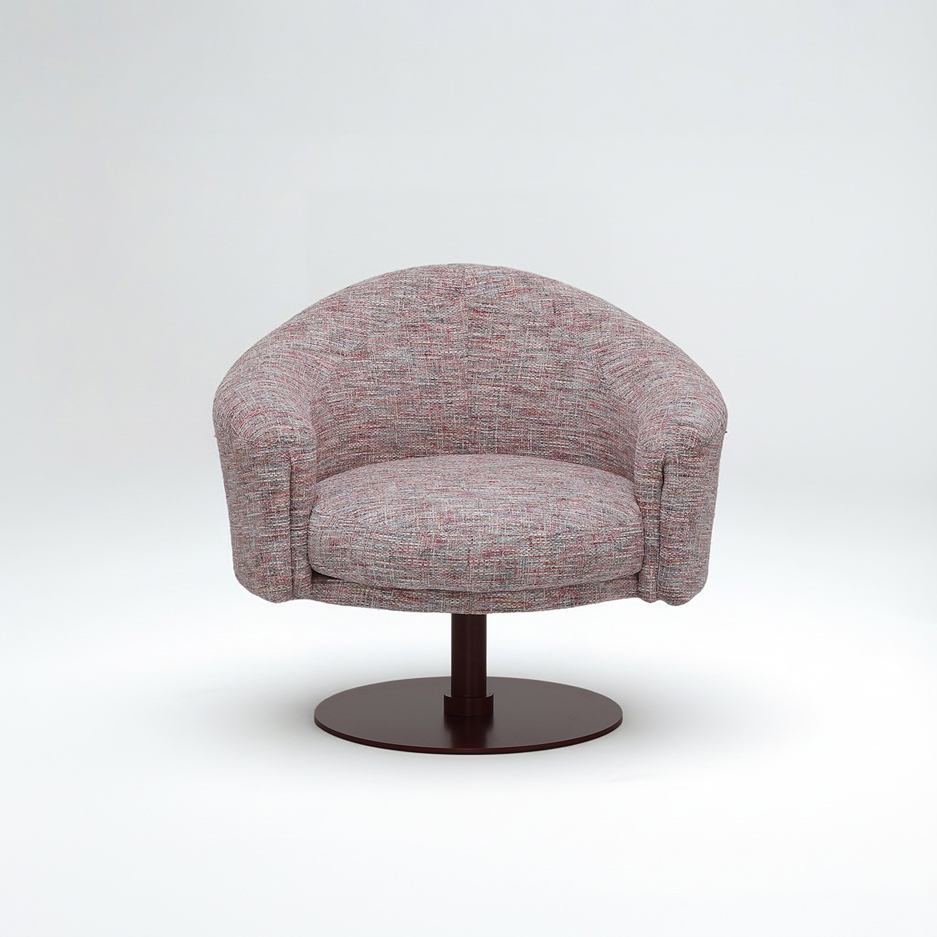 Upholstered swivel chair with a rounded back and armrests, perfect for contemporary living room deco.