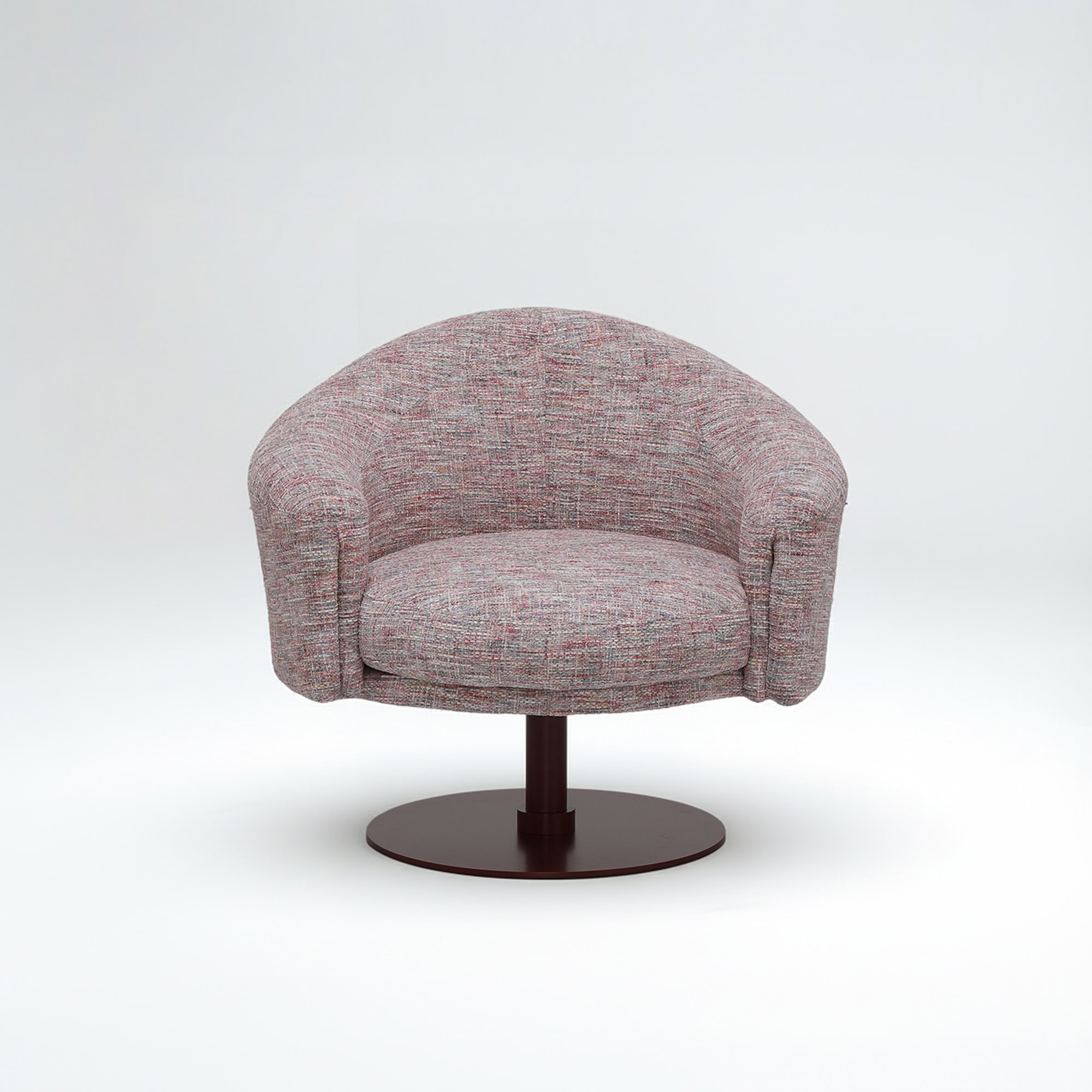 Upholstered swivel chair with a rounded back and armrests, perfect for contemporary living room deco.