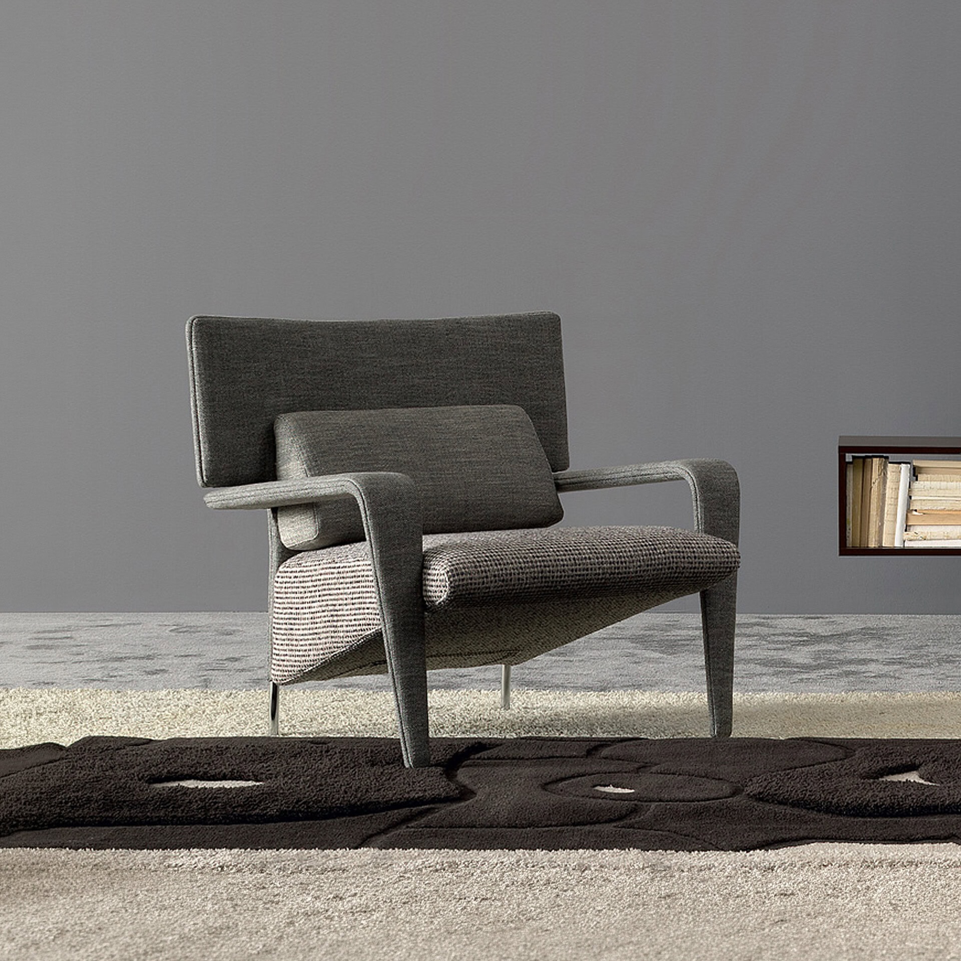 Contemporary upholstered armchair with sleek design and comfortable cushioning.