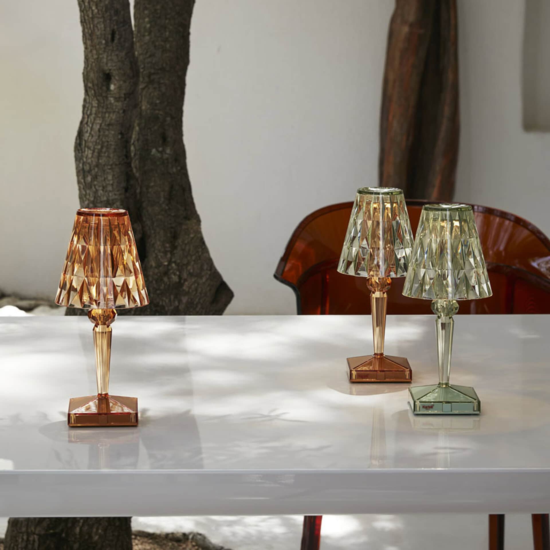 Stylish glass table lamps with faceted shades, perfect for contemporary home decor.