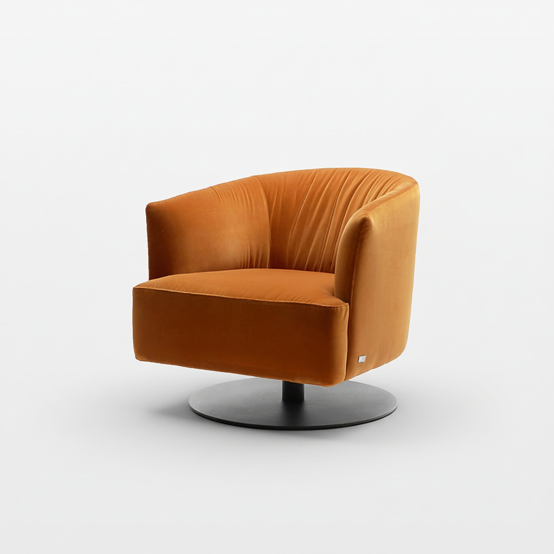 Orange lounge chair with a sleek, contemporary design and rounded backrest.
