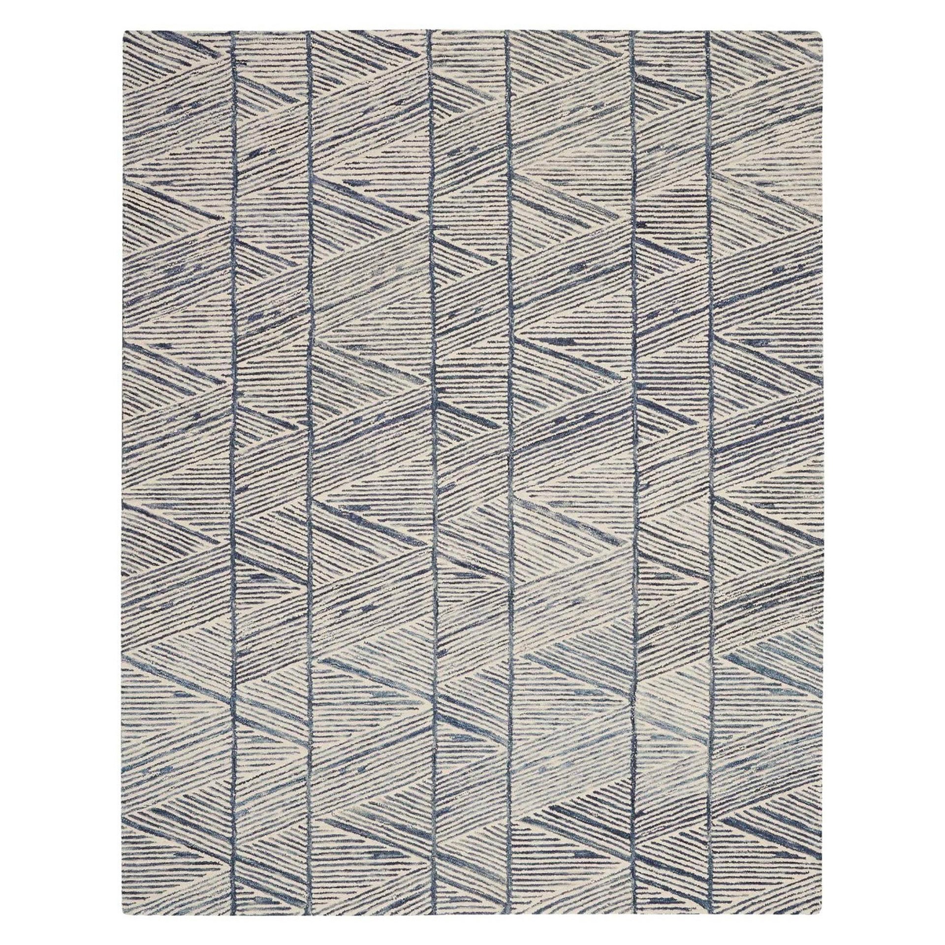 Rectangular area rug with an abstract geometric pattern of blue lines forming triangles on a cream background.
