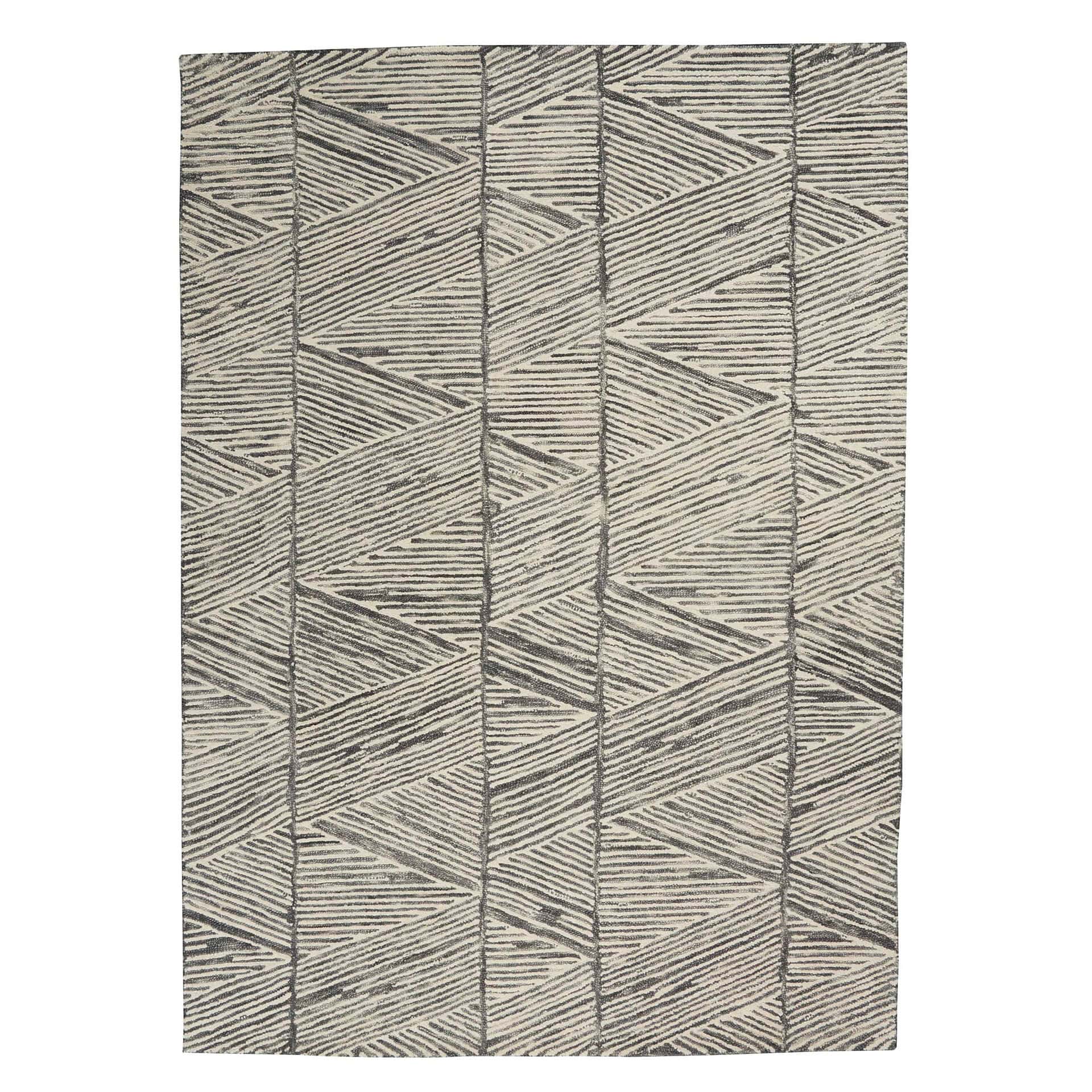 Geometric patterned rug with neutral tones, ideal for modern living rooms and bedrooms.