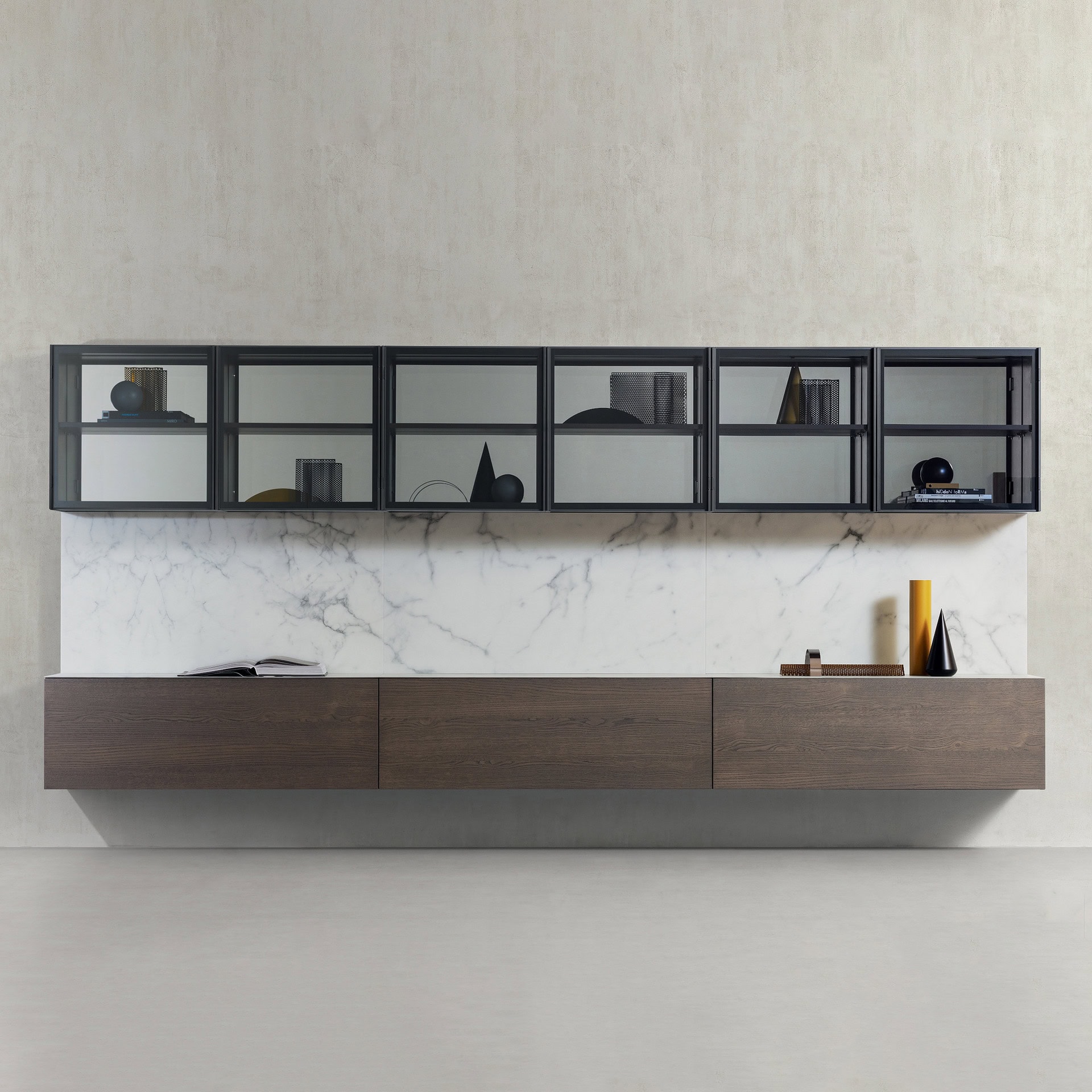 Wall-mounted black metal and glass shelving with wooden cabinet base.