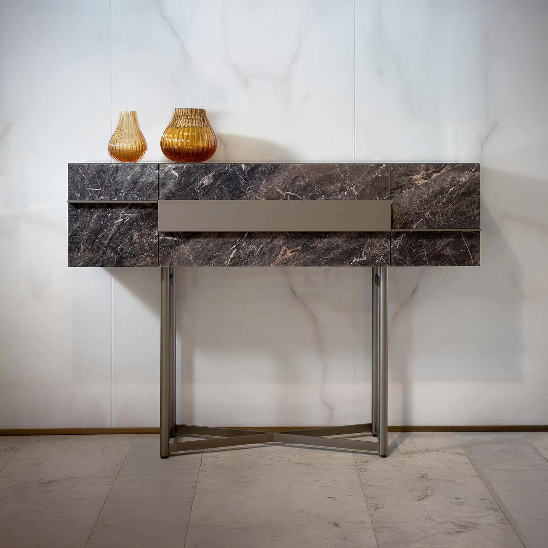 Elegant marble console table with gold vases for stylish home decor.