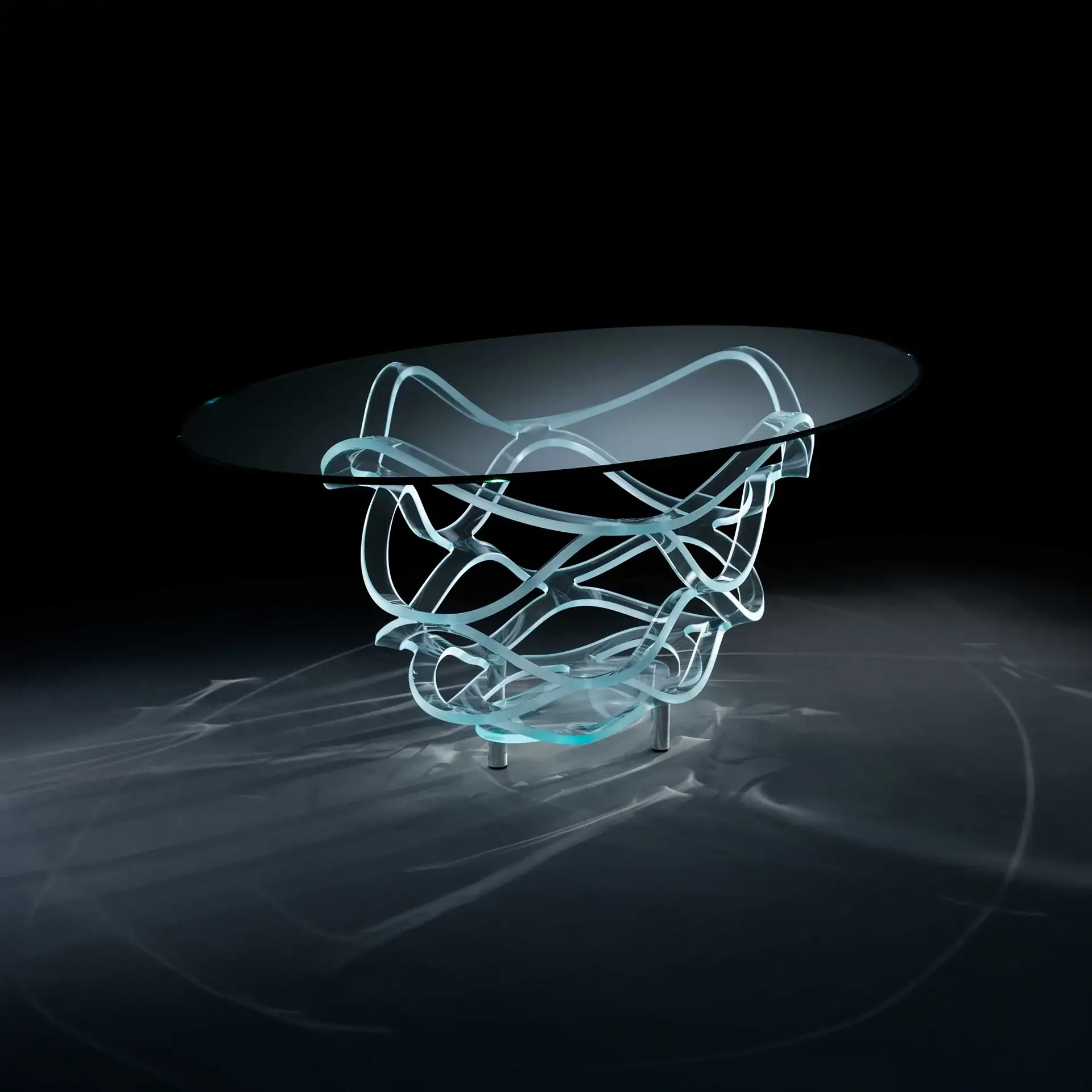 A modern coffee table with a clear circular glass top and a sculptural base made of intertwined, wavy strips of light blue-tinted glass, resting on metallic feet against a dark background.