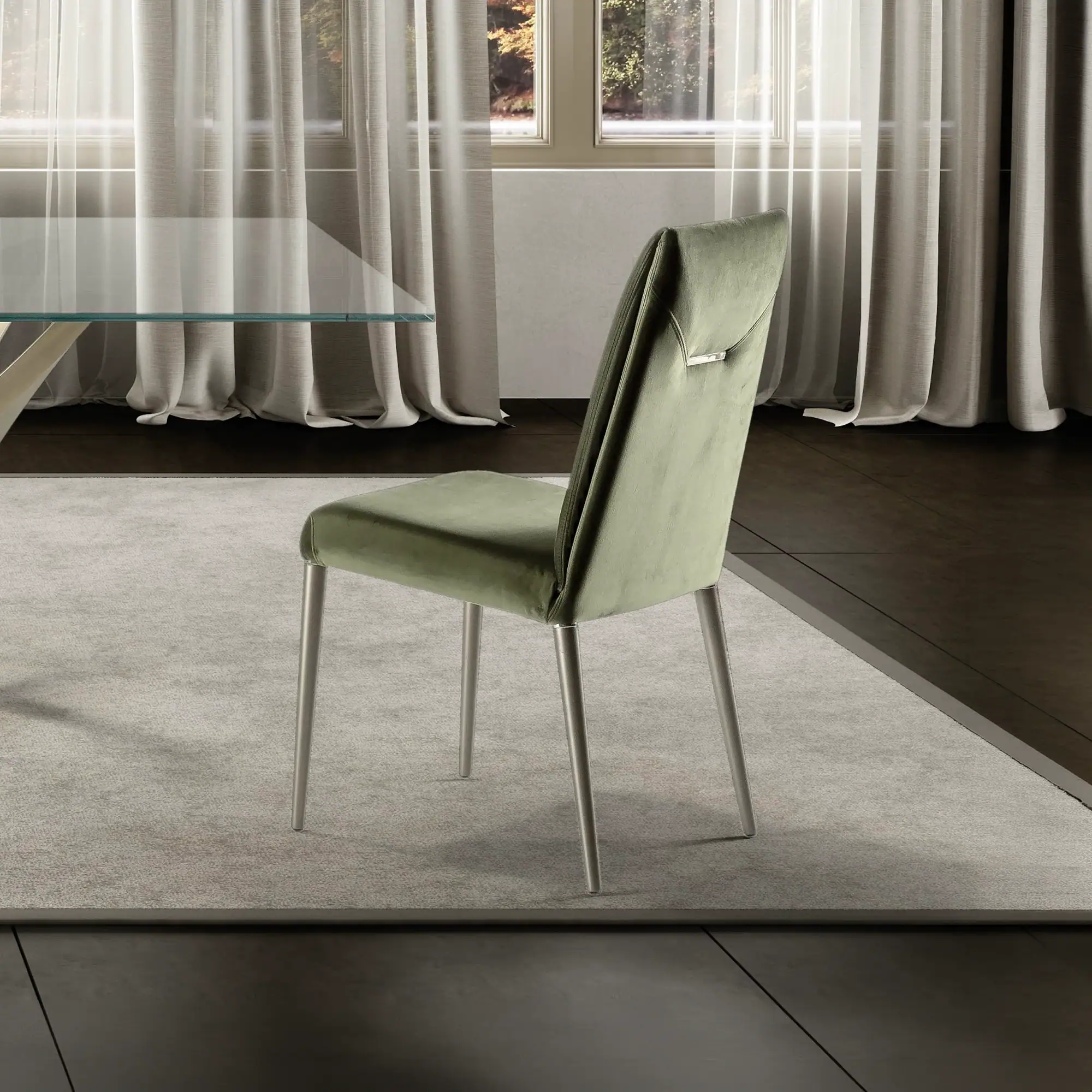Sklar Furnishings soft green dining chair in modern room setting.