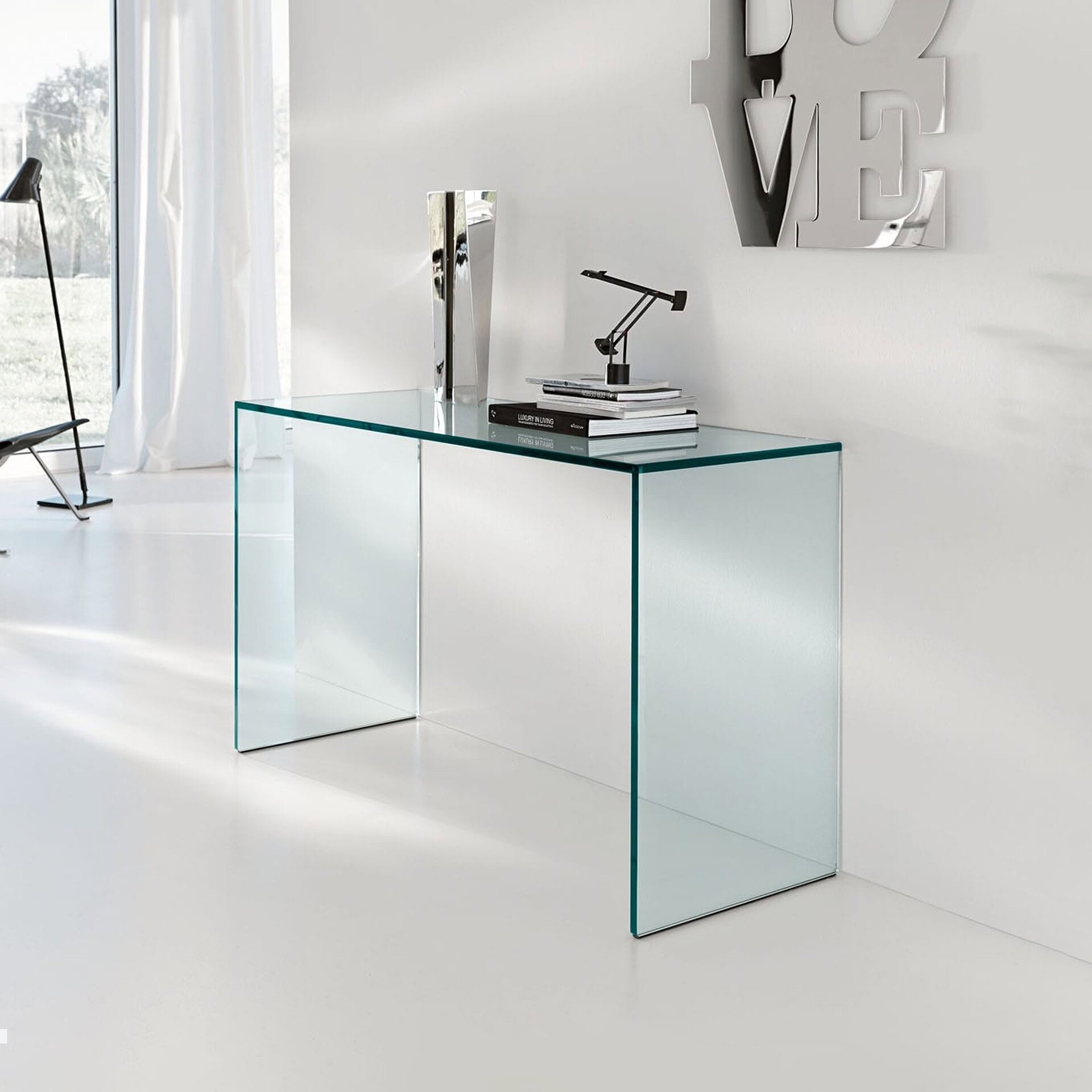 Elegant glass console table in a contemporary living space.