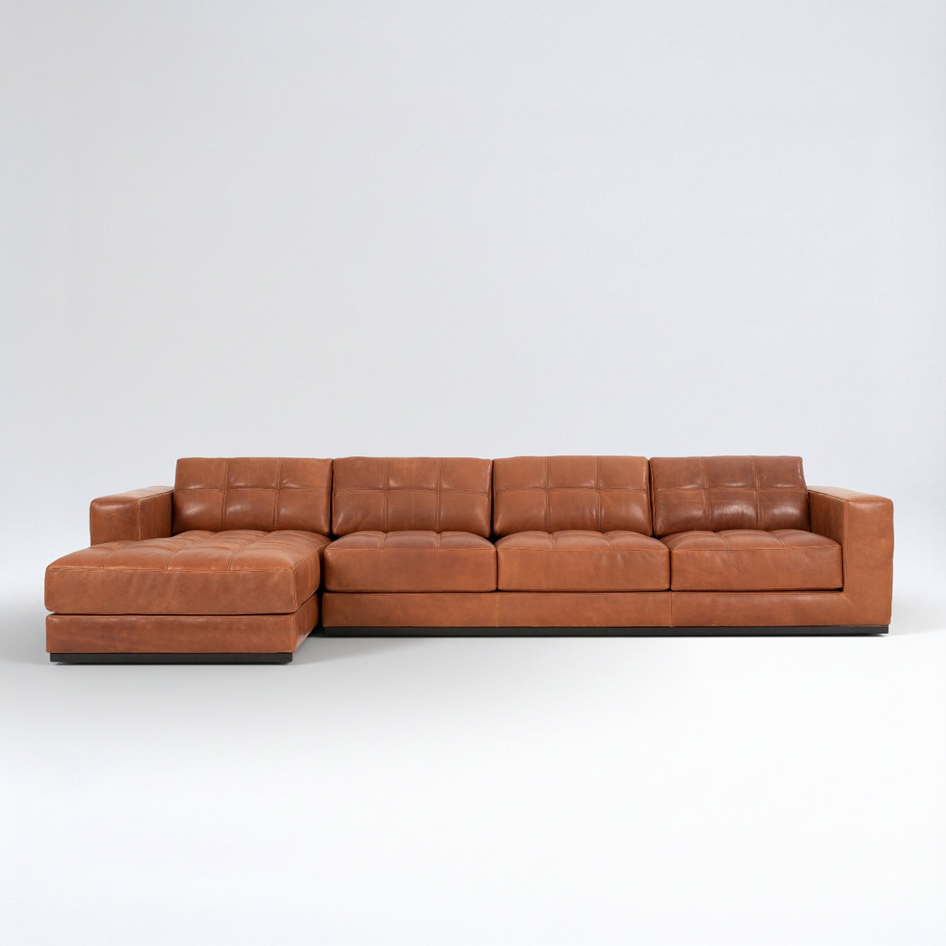 Elegant brown leather Barcelona sectional sofa with chaise lounge, perfect for contemporary living s.