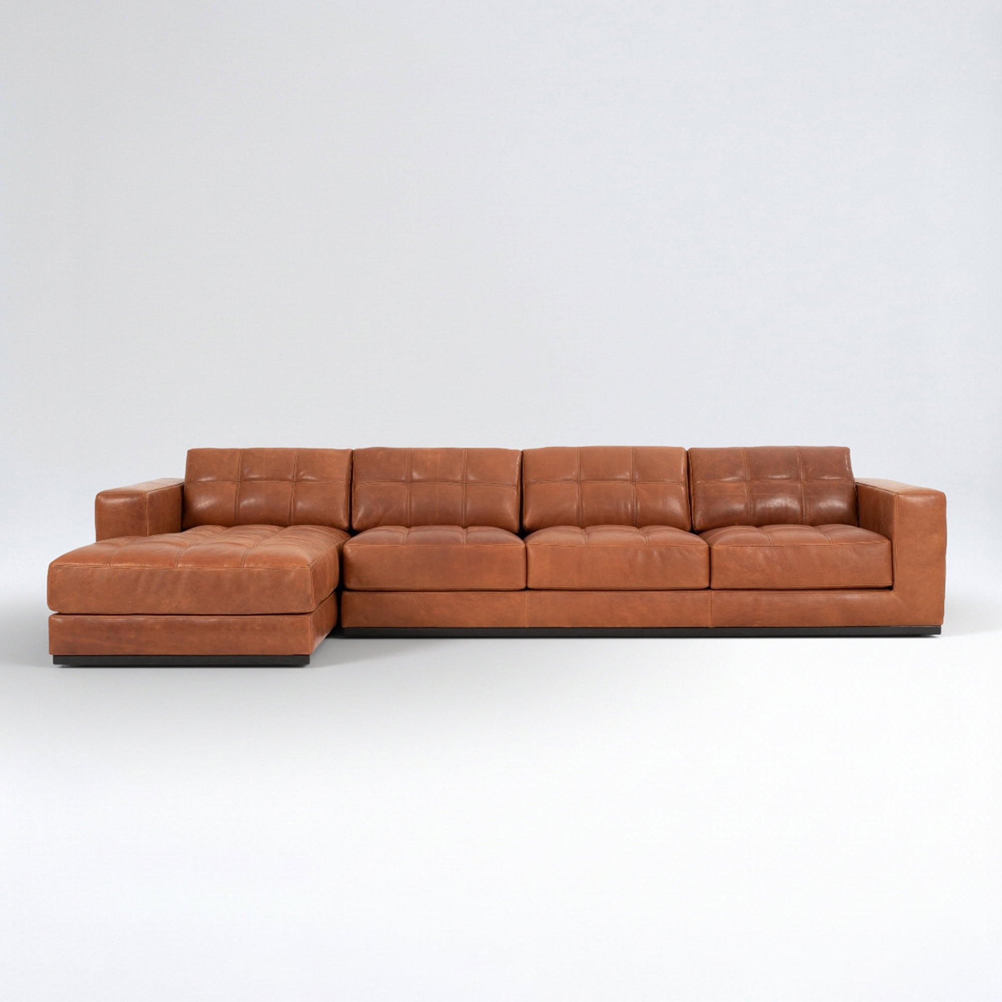 Elegant brown leather Barcelona sectional sofa with chaise lounge, perfect for contemporary living s.