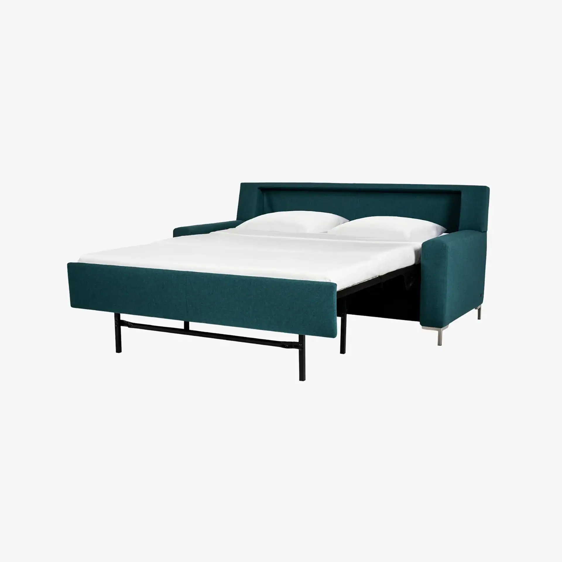 Teal sofa bed fully extended into a bed, with white sheets and two white pillows, against a light gray background.