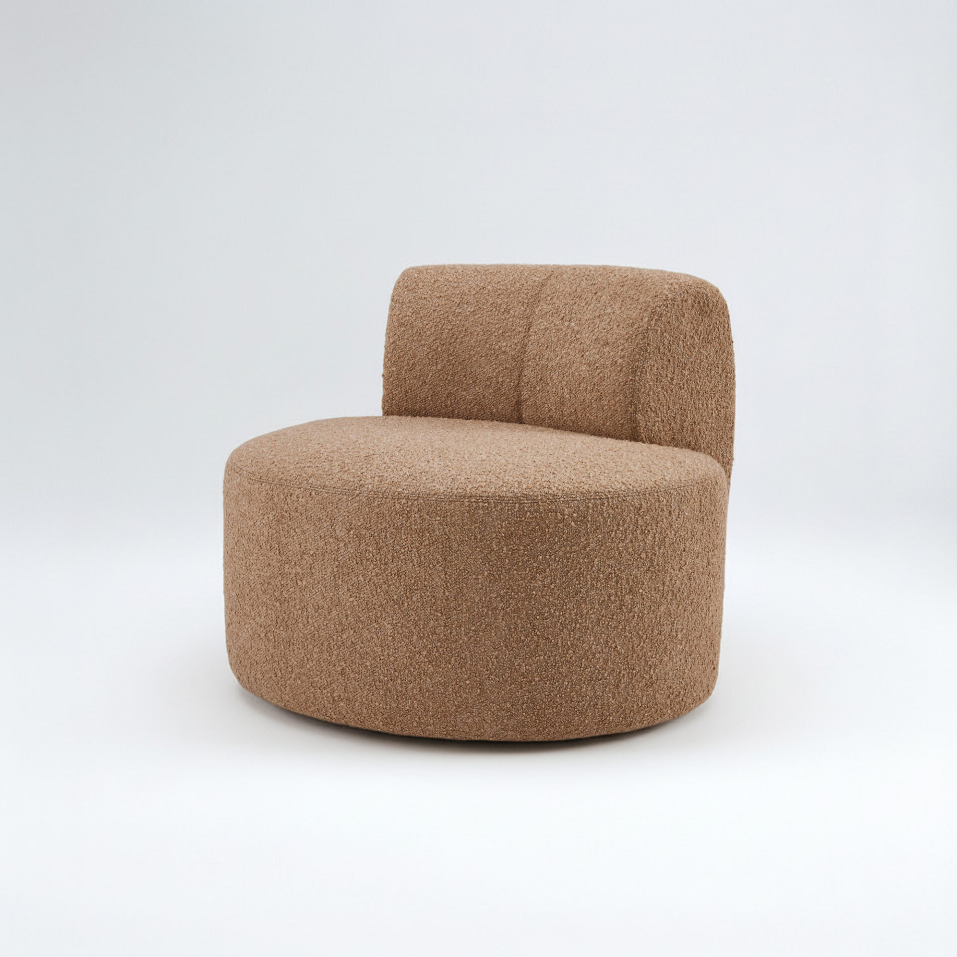 A round, brown bouclé armchair with a curved backrest, set against a white background.