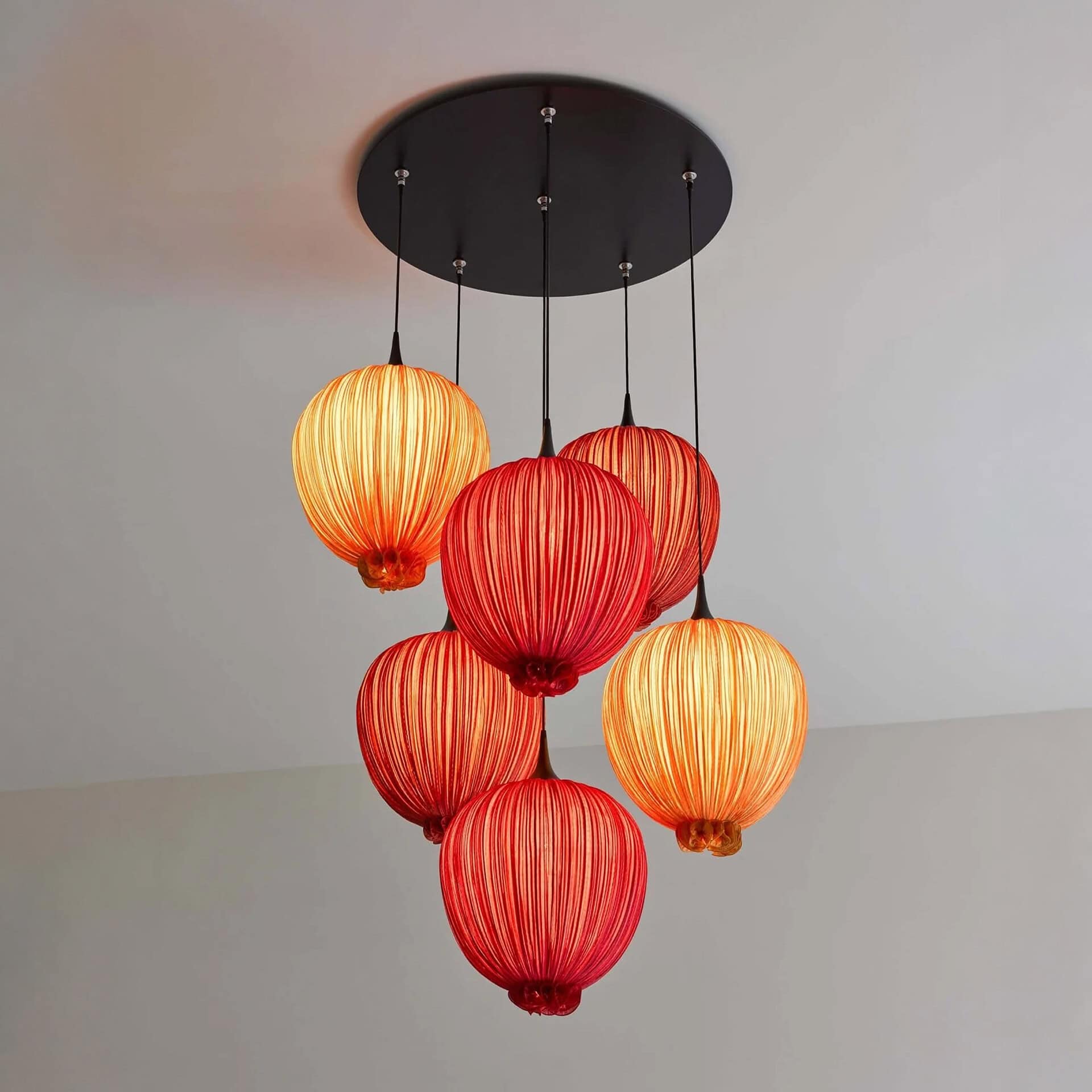 Elegant Dippa Silk Pendant Light with vibrant red and orange shades. Perfect for modern and stylish.