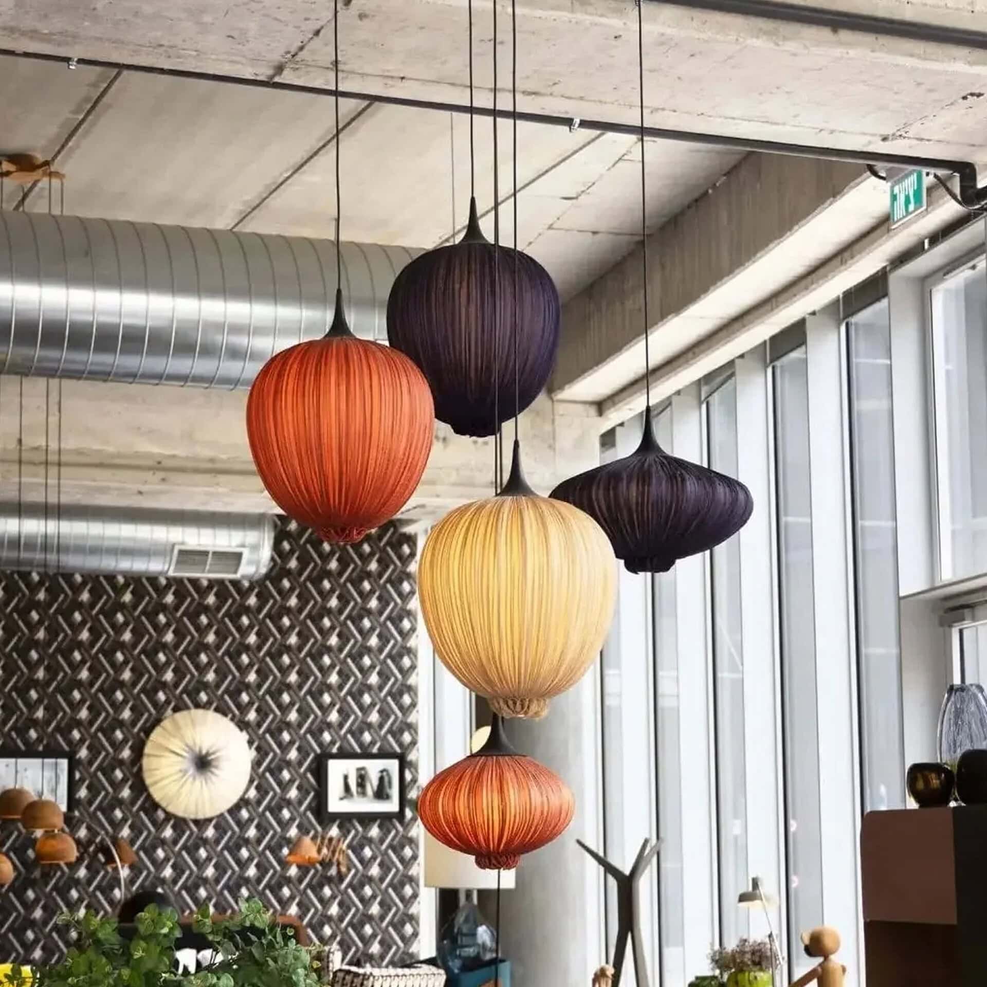 Elegant Dippa silk pendant light with colorful shades for modern interiors.
