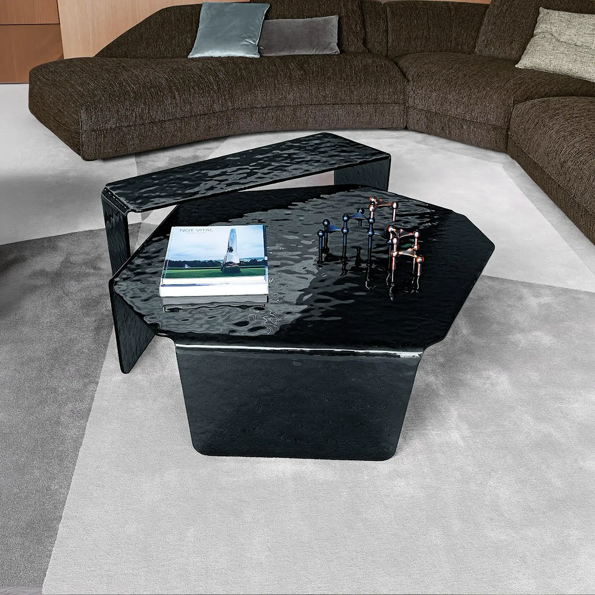 Sklar Furnishings Chimera Hammered Glass Coffee Table in living room.