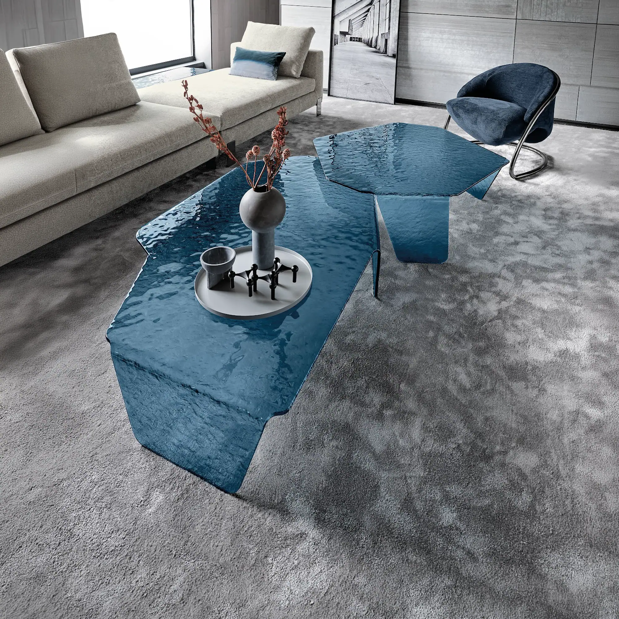 Sklar Furnishings blue hammered glass coffee table in modern living room.