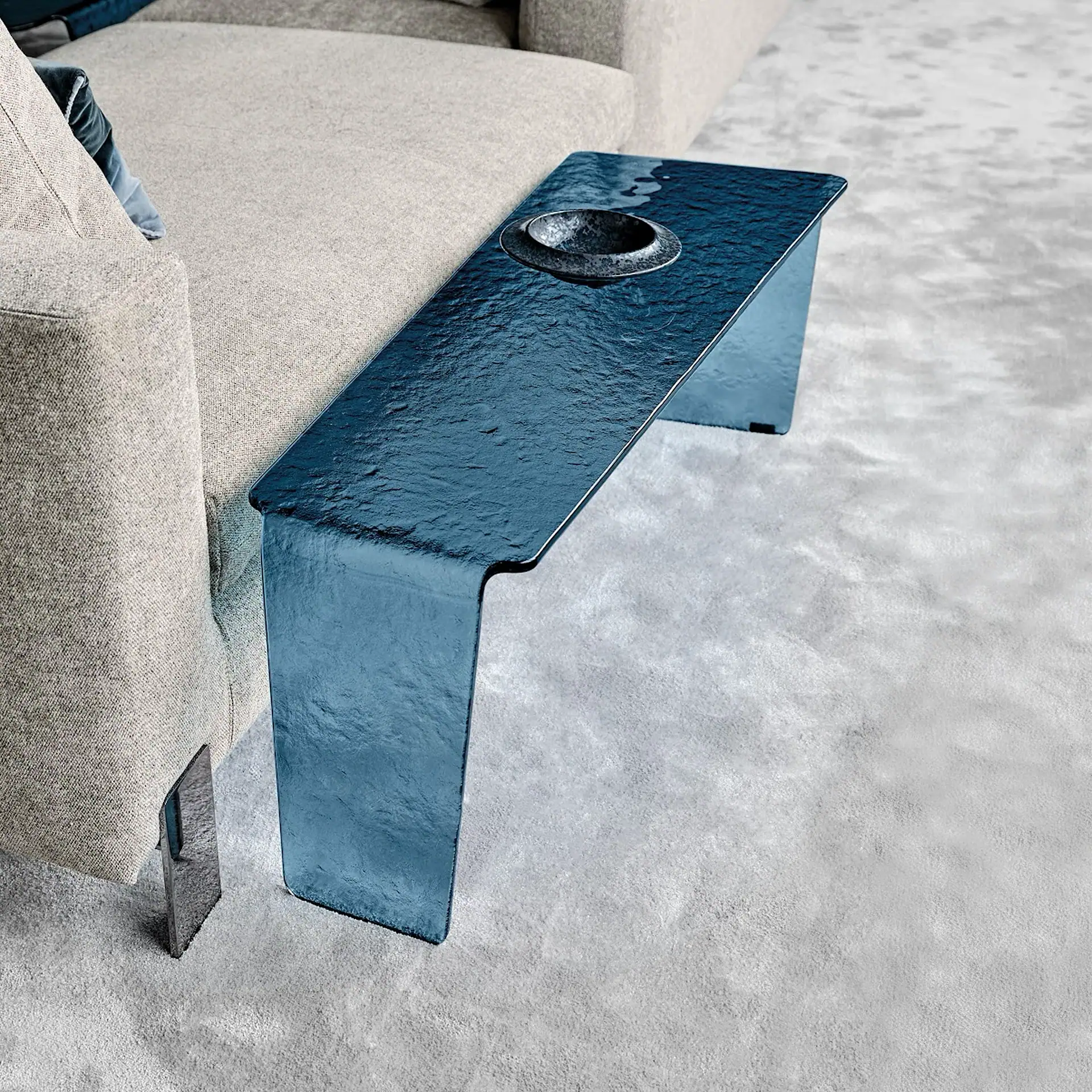 Sklar Furnishings blue metal side table with a circular indentation on top.