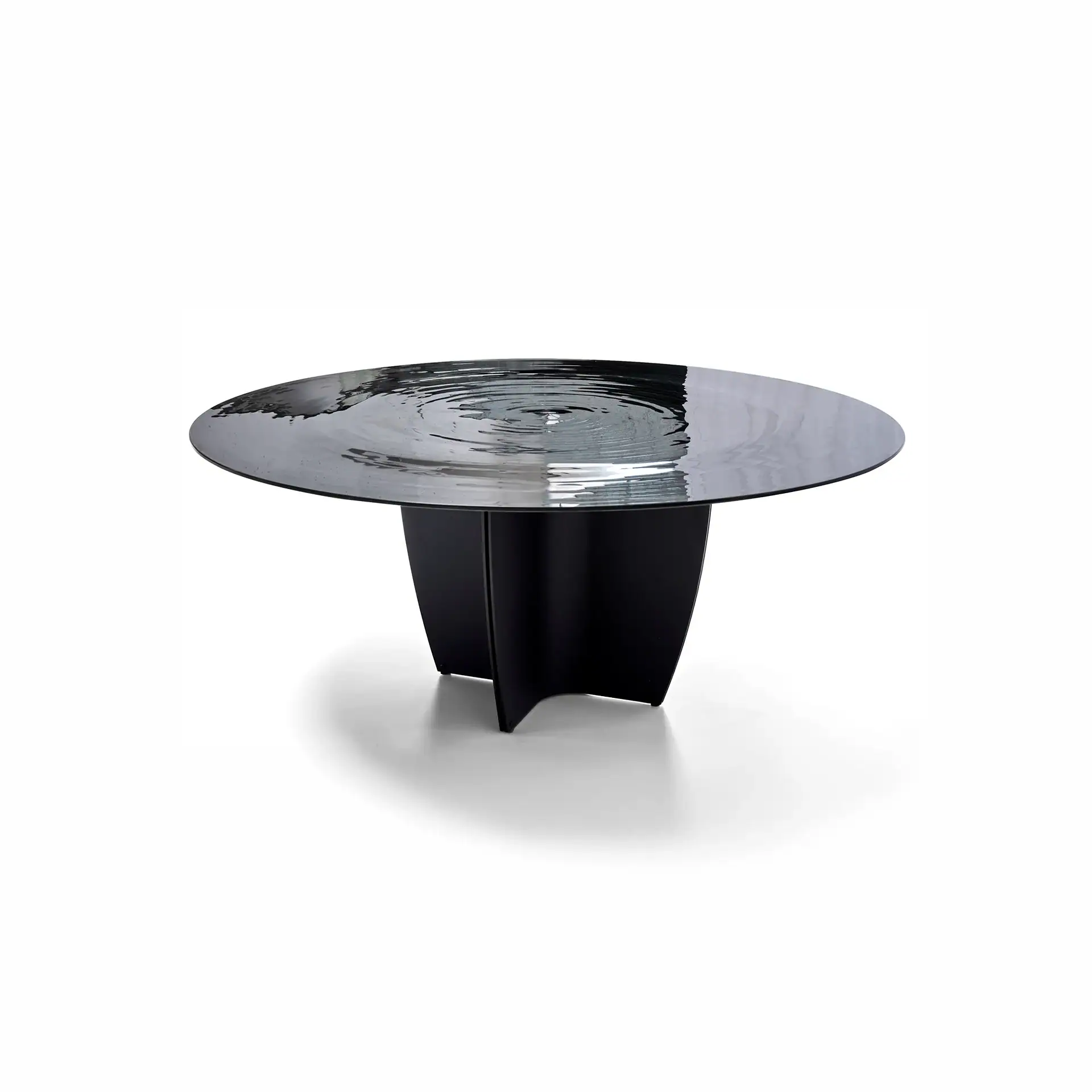 A round table with a dark, rippled top resembling water and a matte black, sculptural base, set against a white background.