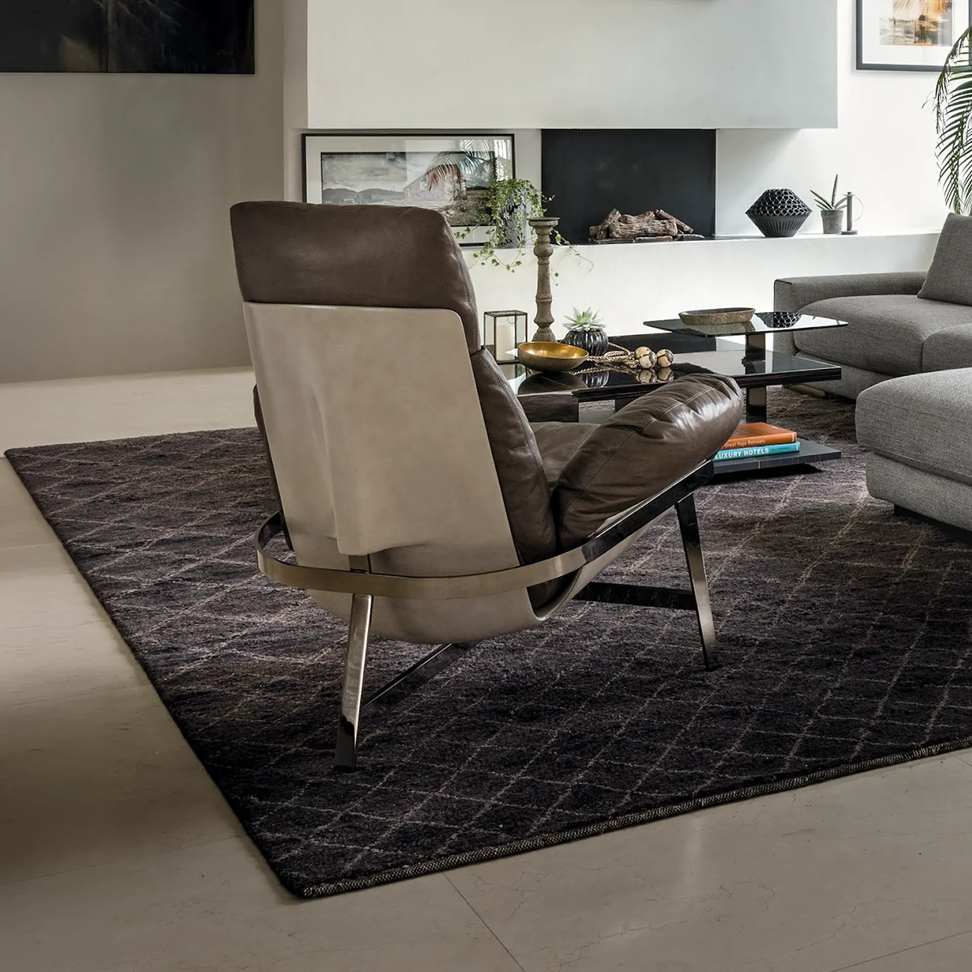 Sklar Furnishings Jupiter Sculptural Lounge Chair in neutral tones in living room.