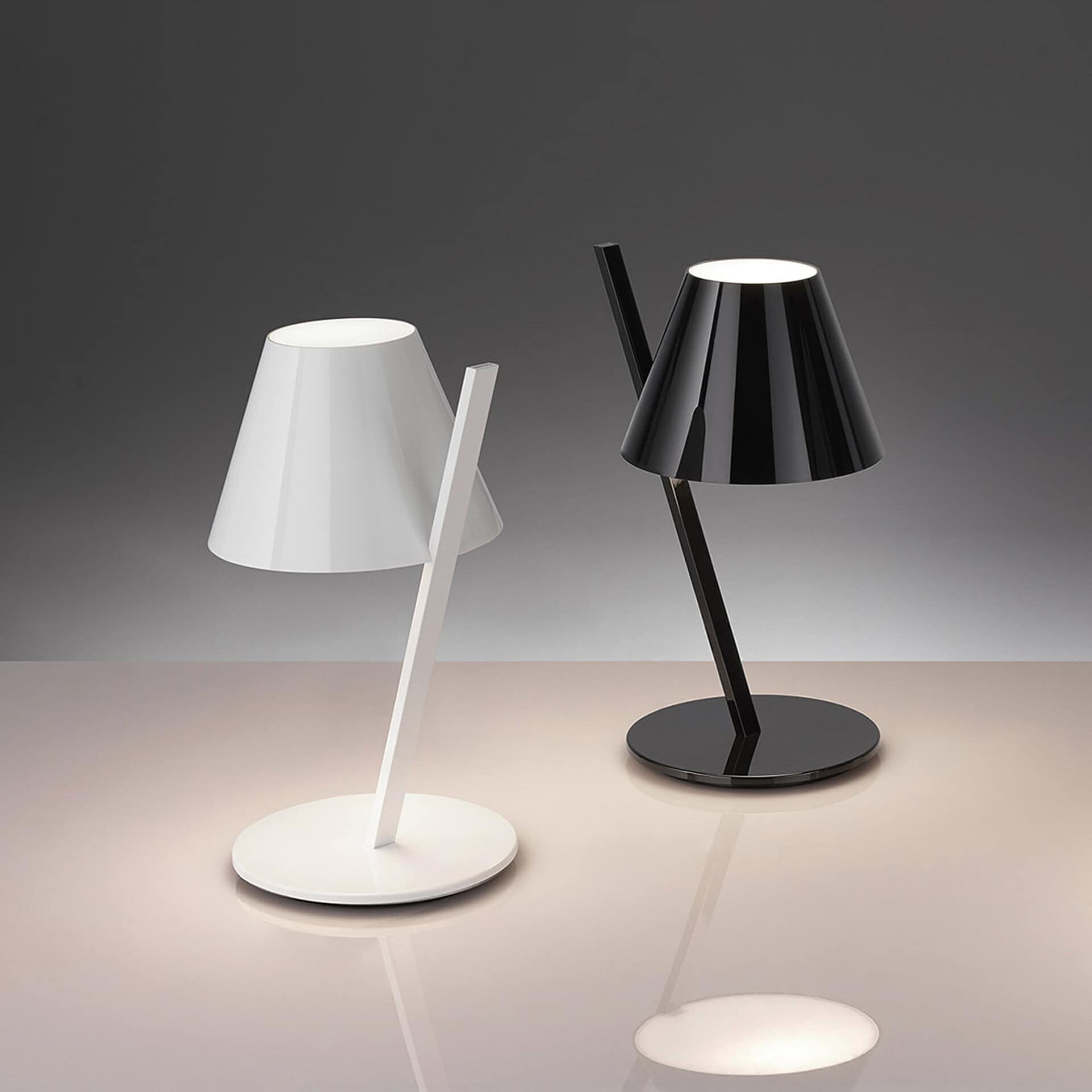 Modern black and white La Petite Table Lamps with sleek design.