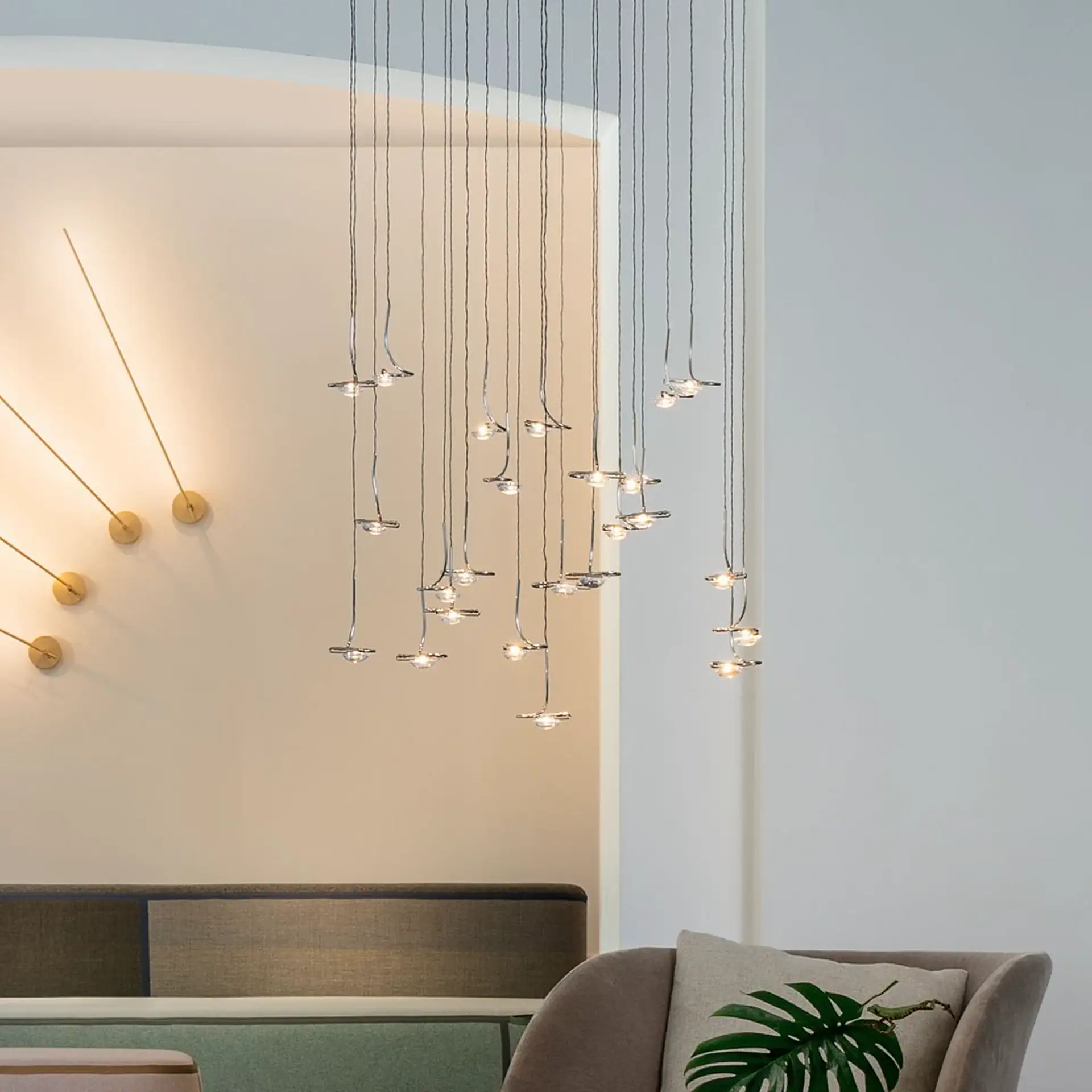 Sklar Furnishings Jackie O Sculptural Chandelier hanging in a modern room.