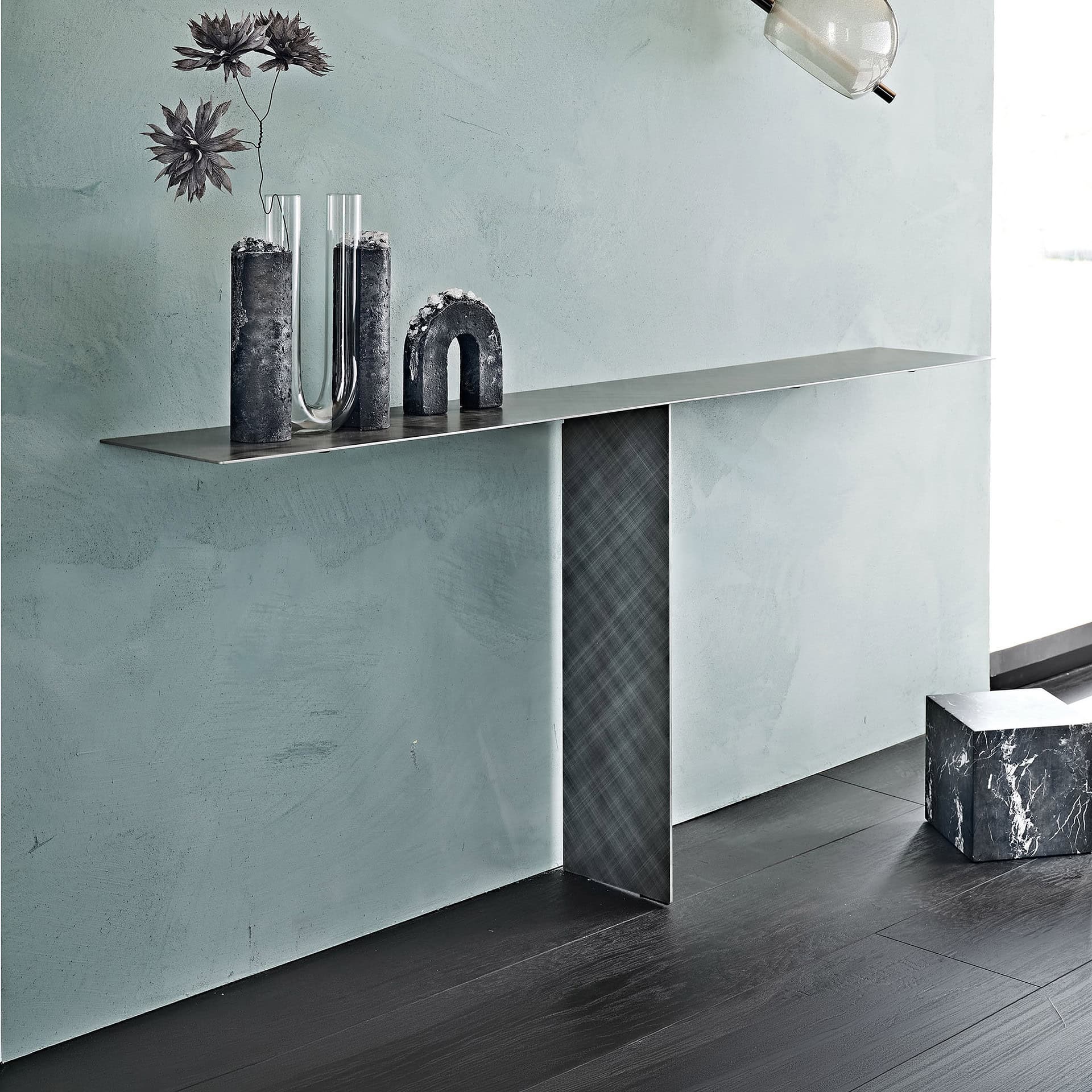 Elegant modern Tee console table with sleek metal finish.