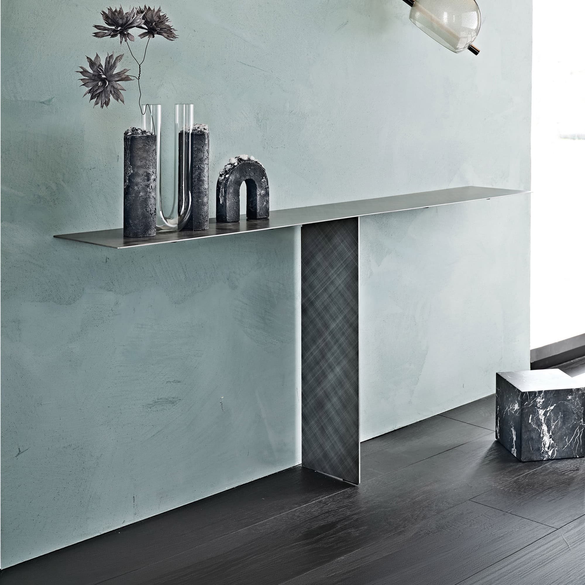 Elegant modern Tee console table with sleek metal finish.