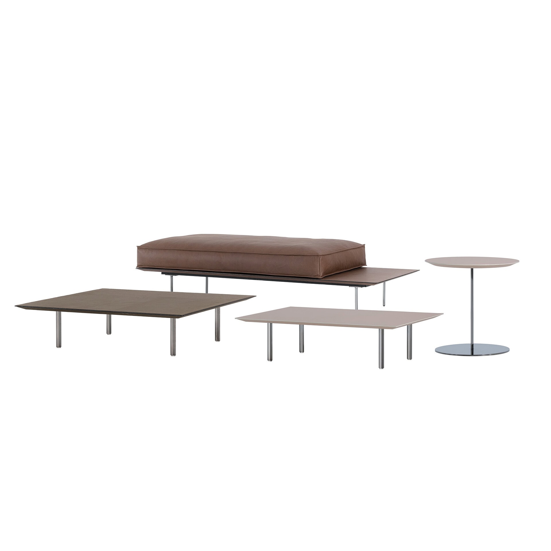 Modern leather coffee table with sleek design and matching side tables.