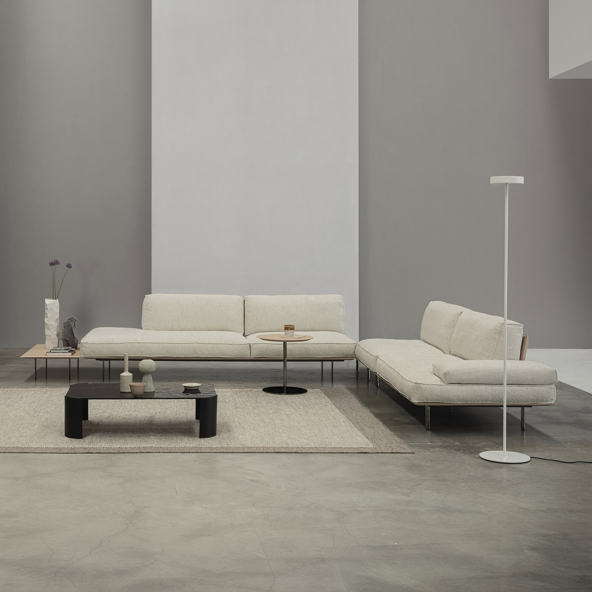 Modern Vogue sectional sofa in a minimalist living room setting.