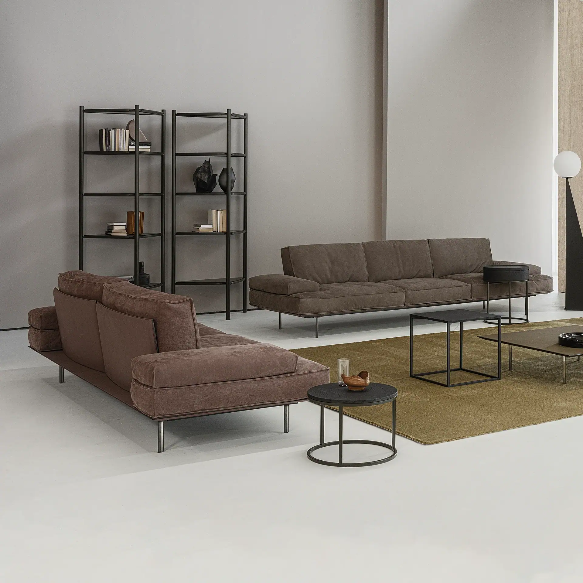 Modern Vogue Modular Sofa with black metal frame and plush cushions.