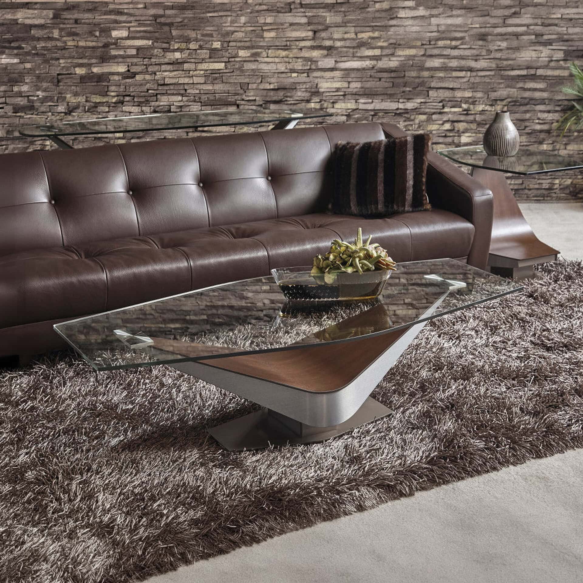 Modern Elite Victor Cocktail Table with glass top in stylish living room setting.